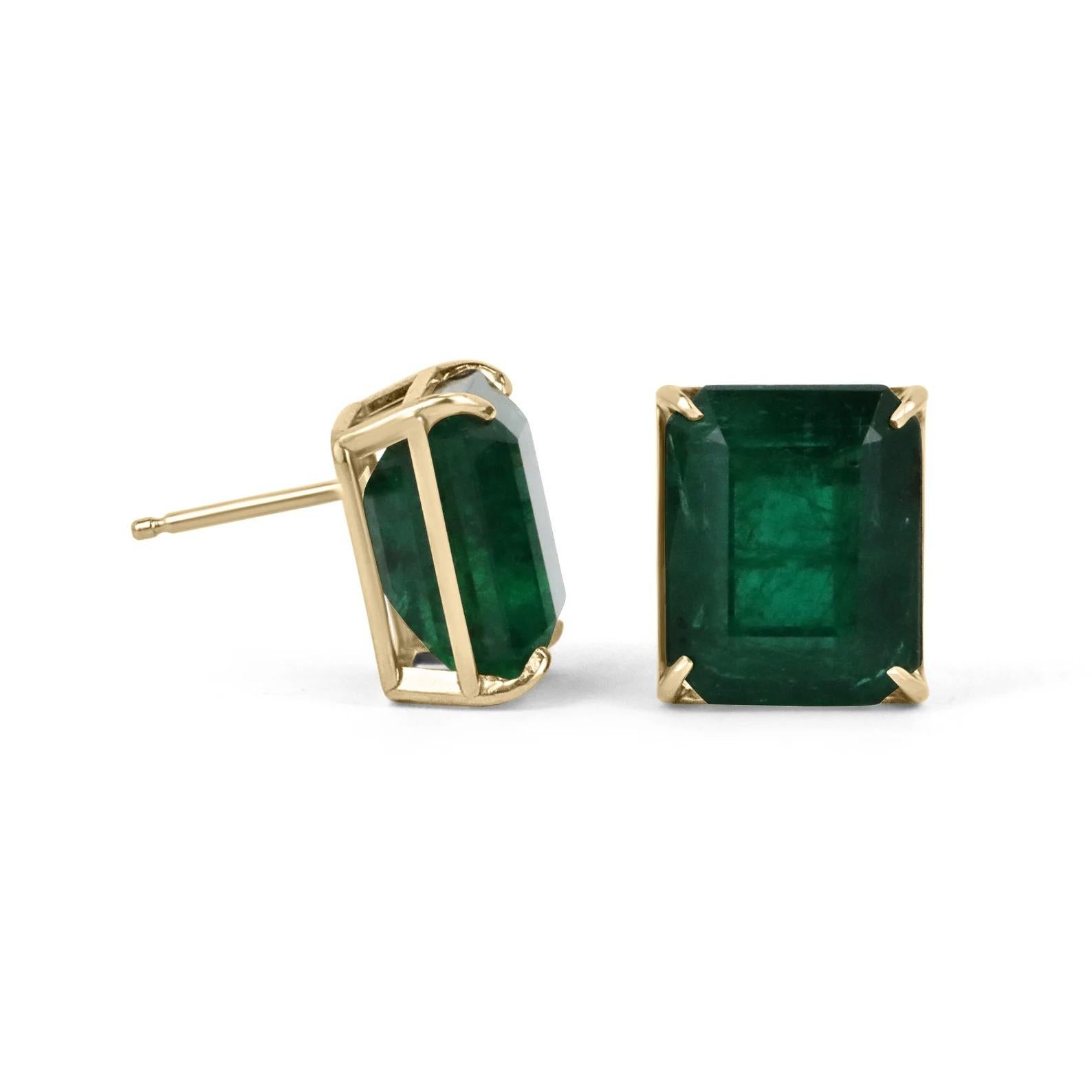 Featured here is a LARGE set of emerald cut, top-quality Zambian Vivid Dark Green emerald studs handcrafted and set in fine 18K yellow gold. Displayed are vivacious deep-green emeralds with very good transparency, accented by elegant claw prongs,