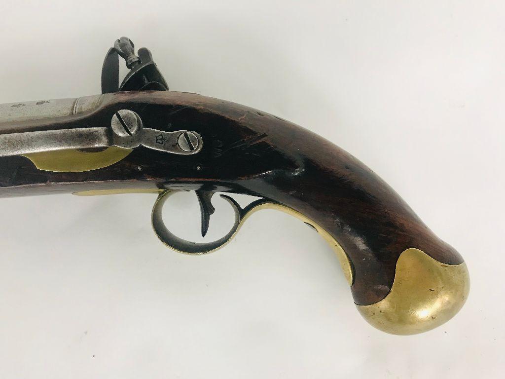 Exceptional example of a British Tower Naval Sea Service flintlock pistol. It is dated 1805 at the top of the grip under an anchor cartouche. Has attached belt clip. Rare original condition. Excellent mechanical function and just a great looking