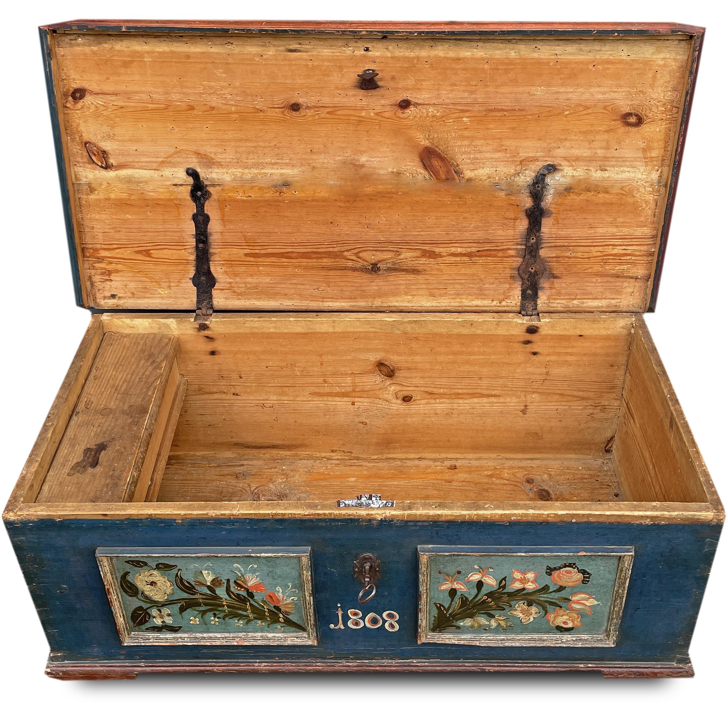 Blue Painted Chest Dated 1808

Measurements: H. 44cm – L. 122cm – P. 58cm
Period: 1808
Origin: Tyrol
Essence: Fir

Ancient painted chest, in fir wood, entirely painted in intense blue.
On the front there are the date and two generous framed panels,