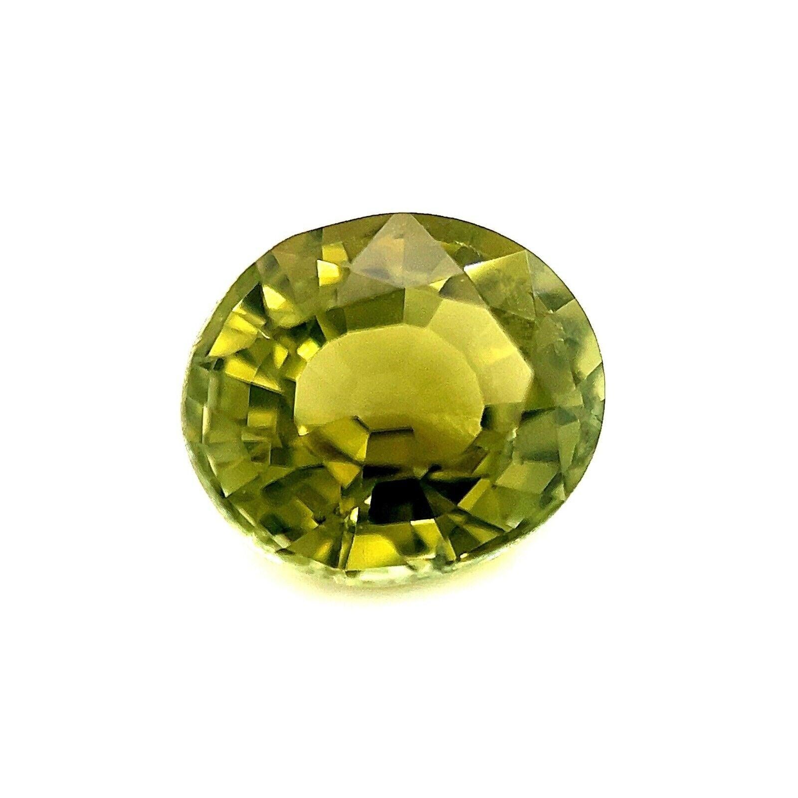 1.80ct Fine Olive Green Tourmaline Oval Cut Loose Gemstone 8x6.8mm

Natural Olive Green Tourmaline Gemstone.
1.80 Carat stone with a beautiful olive green colour and very good clarity. Also has an excellent oval cut with good proportions and