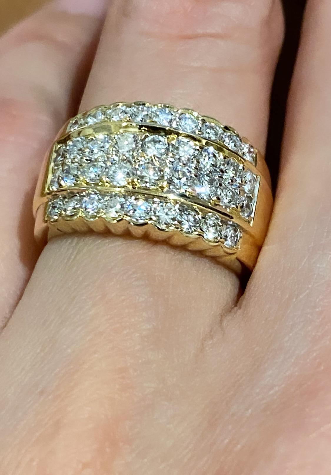Exquisitely crafted in 18K Yellow Gold, 
this superb Retro Ring is 
lavishly set (in 4 rows) 
with Sparkling Round Brilliant Cut Diamonds 
of top quality - G colour, VS clarity 
& of sunlike brilliance, 
mounted in complimenting yellow gold setting,