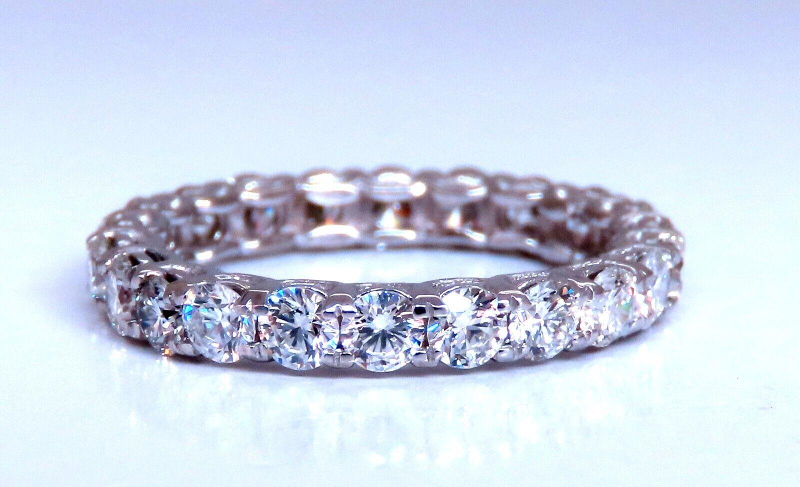 1.80ct. Diamonds eternity band 
Round, Brilliant Cuts

G color 

Vs-2 clarity


Sharing Prong

1.9 grams
Size 5.50 and may not resize.


14kt white gold

 $6000 Appraisal to accompany