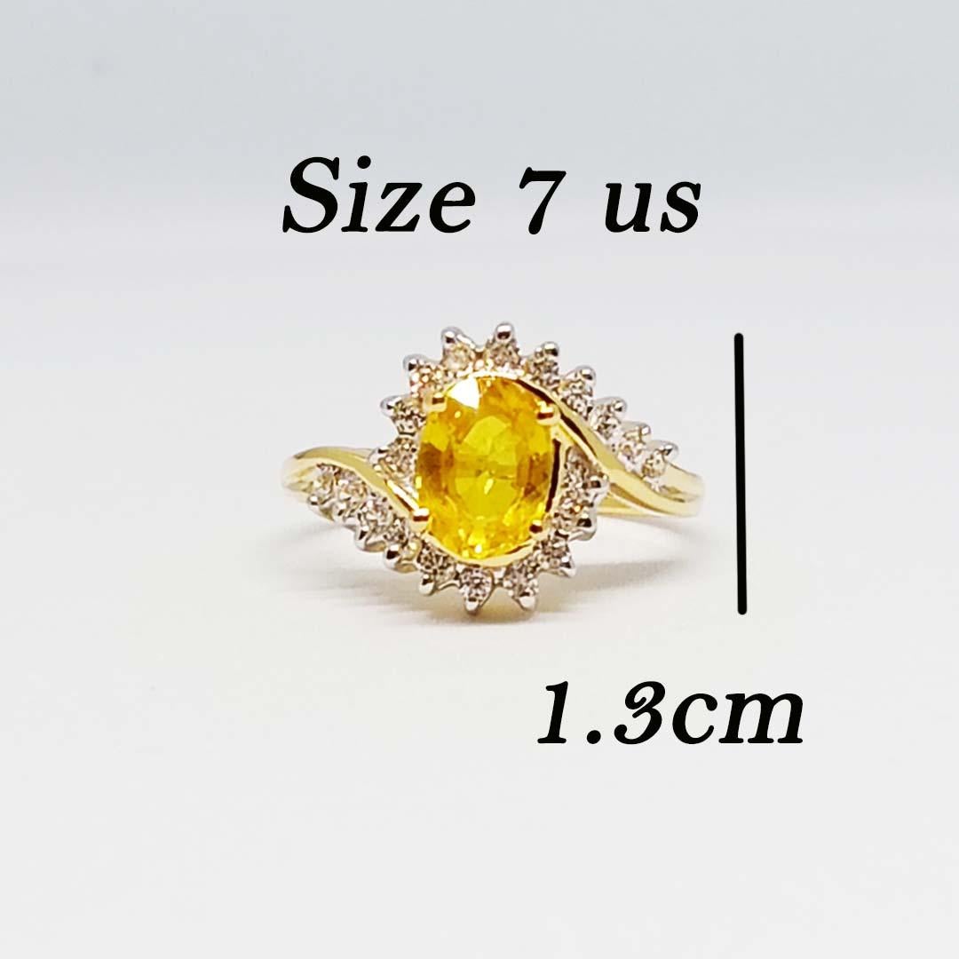 Yellow sapphire Oval 1.80 cts size 8x6 mm.
White zircon round 1.5 mm. 18 pcs.
Sterling Silver on 18 K Gold Plated
Ring size 7 us.
