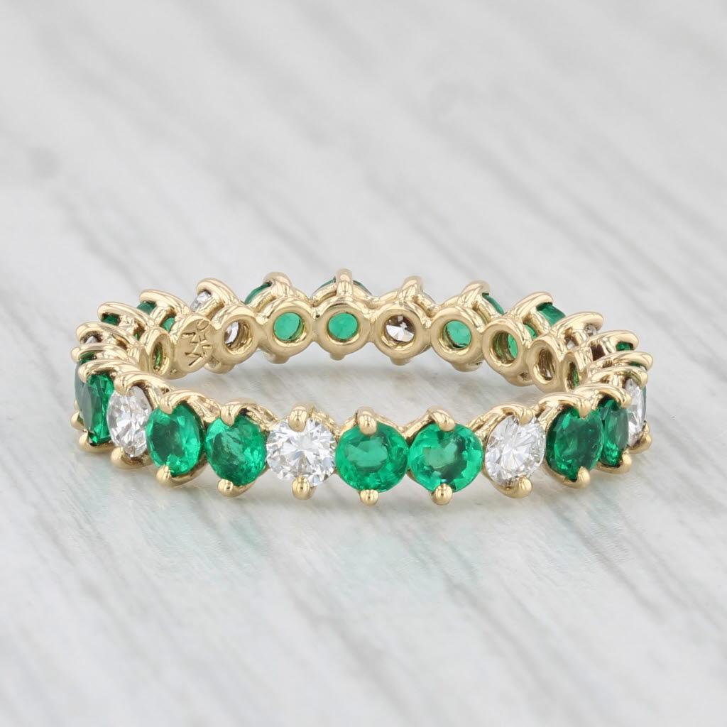 Gemstone Information:
- Natural Emeralds -
Total Carats - 1.28ctw
Cut - Round Brilliant
Color - Green
Treatment - Oiling

- Natural Diamonds -
Total Carats - 0.52ctw
Cut - Round Brilliant
Color - F - H
Clarity - VS2

Metal: 18k Yellow Gold
Weight: