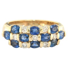1.80ctw Oval Ceylon Sapphire and 0.45ctw Diamond Channel Set Three Row Band Ring