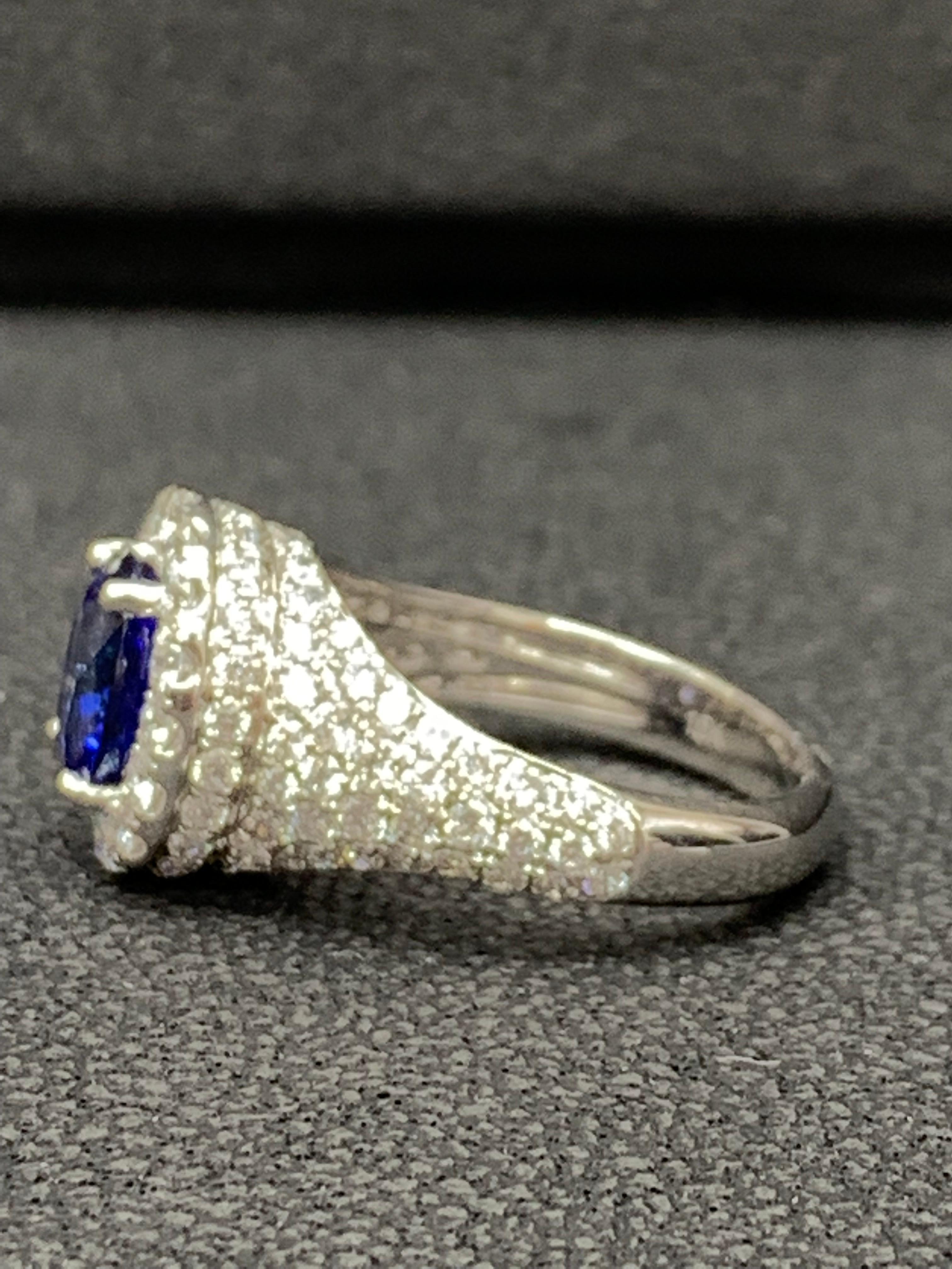 Modern 1.81 Carat Oval Cut Blue Sapphire and Diamond Fashion Ring in 18K White Gold For Sale