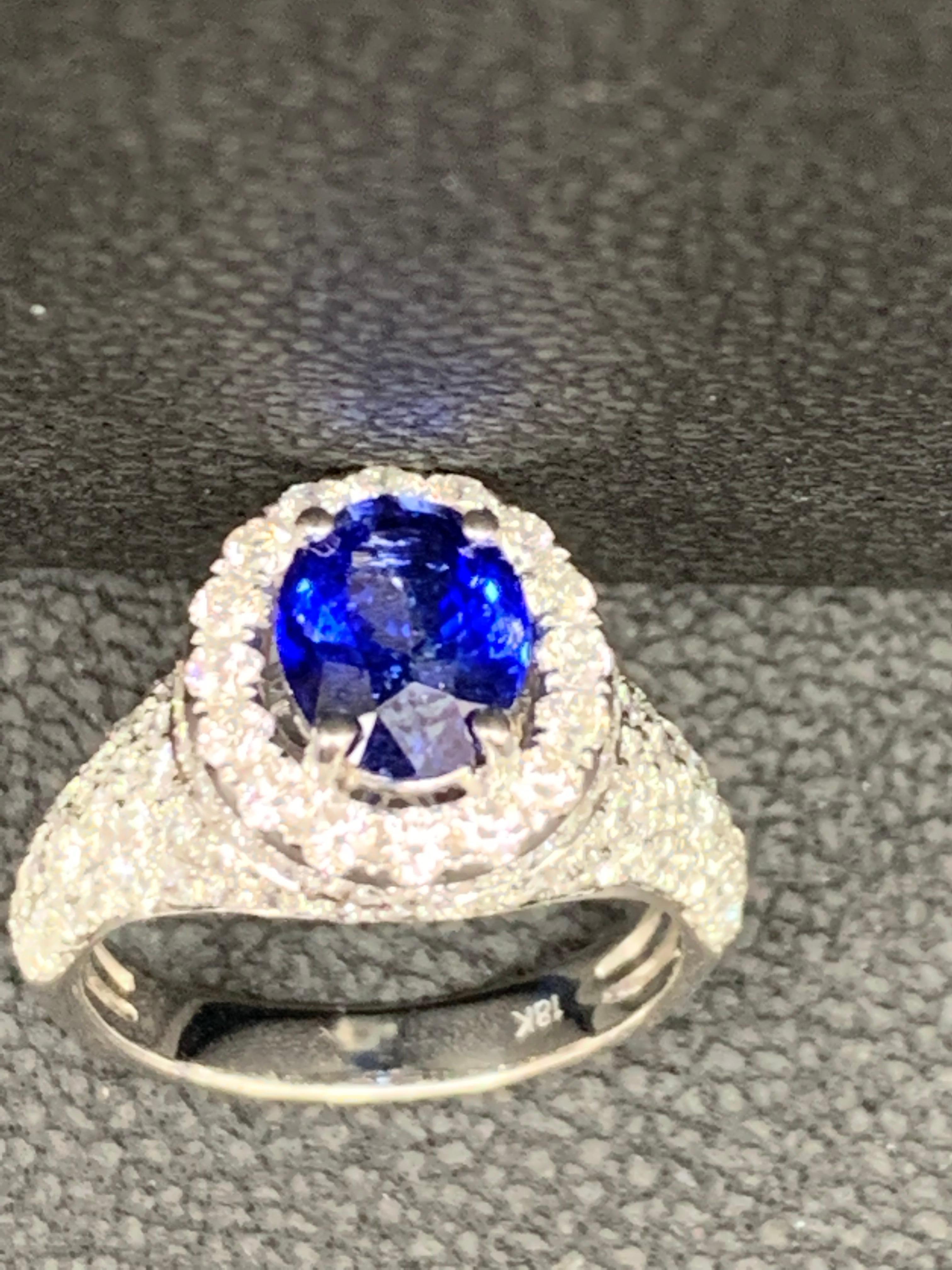1.81 Carat Oval Cut Blue Sapphire and Diamond Fashion Ring in 18K White Gold For Sale 2