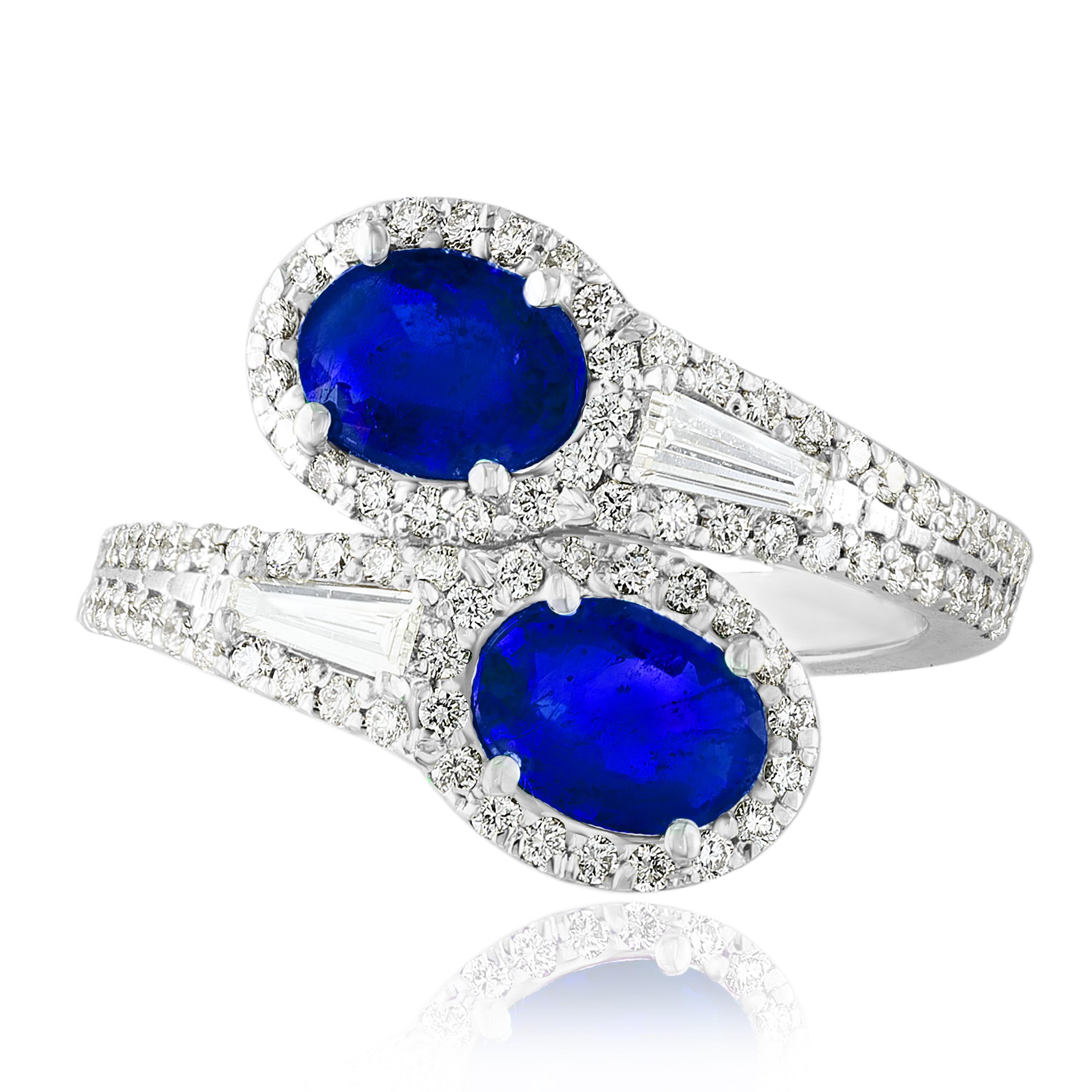 The stunning forever-together Toi et Moi ring features 2 Oval cut Sapphires embraced by east to west 2 baguette diamonds weigh and 84 round diamonds halfway to the shank. Handcrafted in 14k White Gold.
2 oval Emeralds in the center weigh 1.81 carats