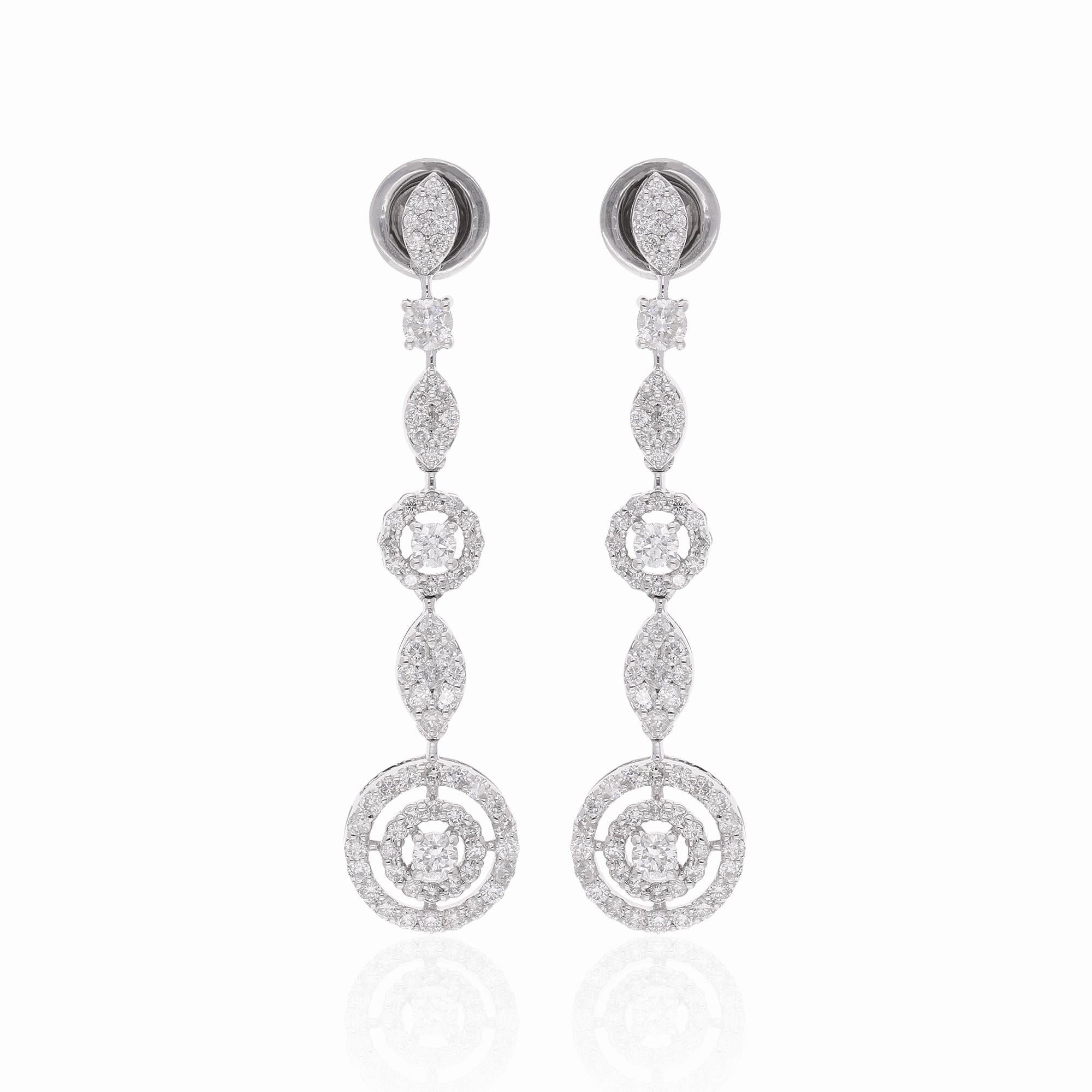Elevate your ensemble to new heights of elegance with these breathtaking 1.81 Carat Pave Diamond Dangle Earrings, a dazzling testament to artisanal craftsmanship and timeless beauty. Handcrafted with meticulous attention to detail, these earrings