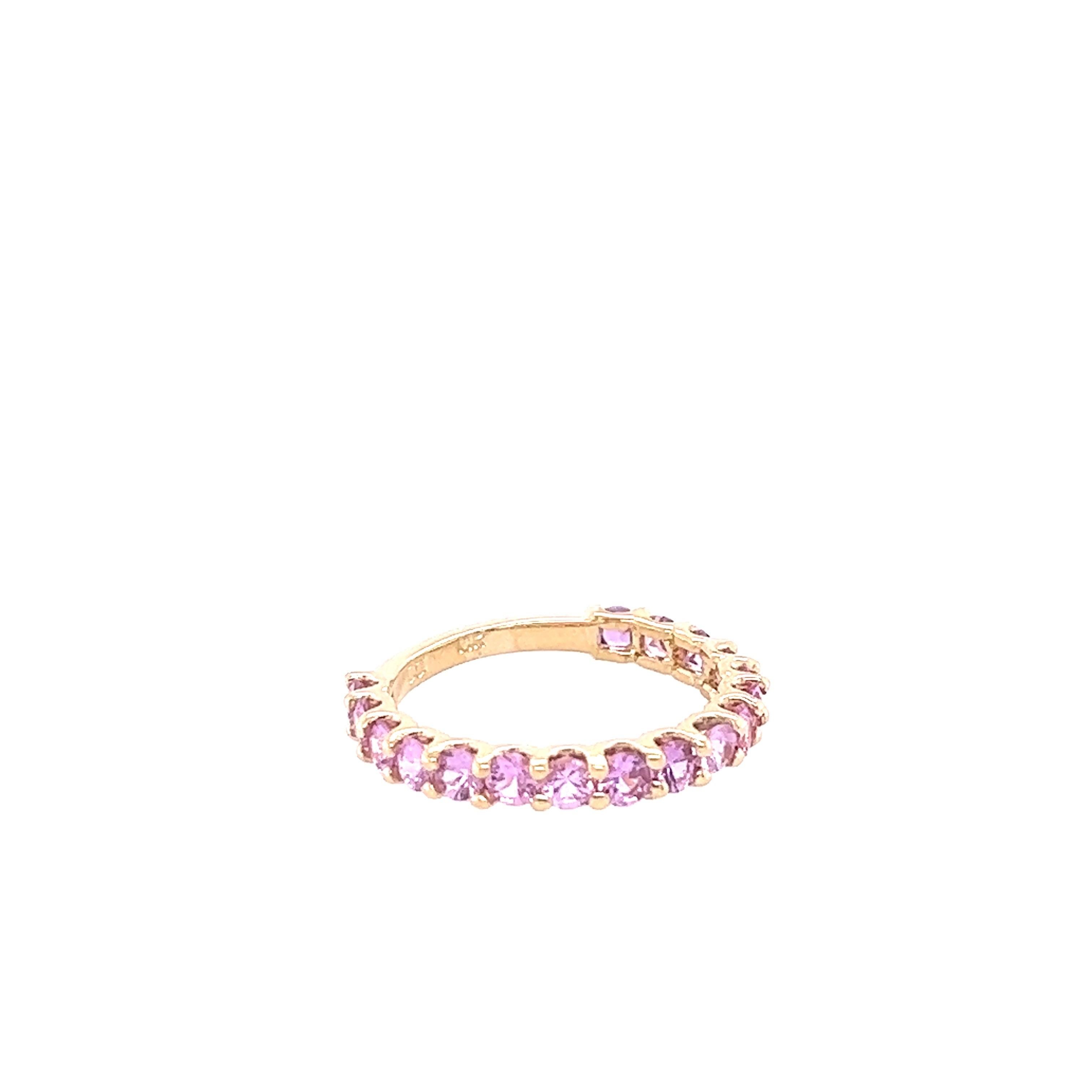 This ring has 17 Natural Pink Sapphires that weigh 1.81 Carats. 

Crafted in 14 Karat Yellow Gold and is approximately 2.2 grams 

The ring is a size 7 and can be re-sized at no additional charge.