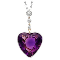 Ciondolo a forma di cuore in oro giallo 14k con ametista da 18,10 carati e diamante da 0,32 carati, CIRCA 1900