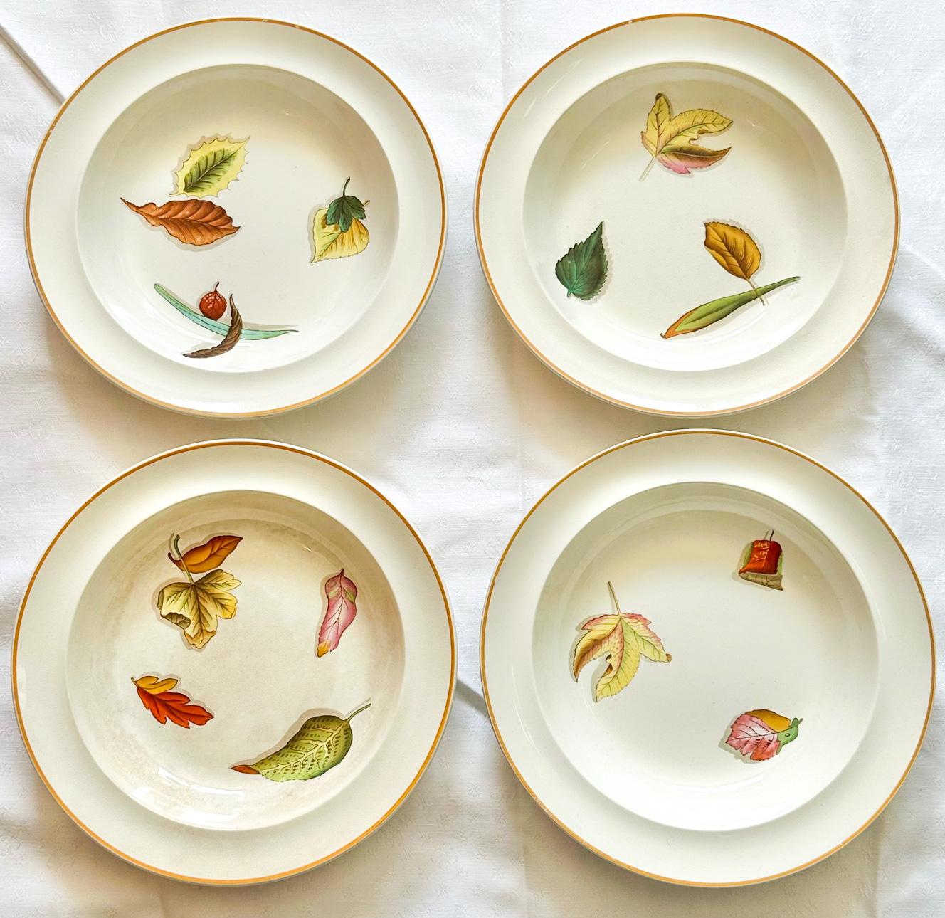 Offered is an extremely rare set of 4 hand-painted 1790-1810 creamware shallow soup bowls, by famed English potter Josiah Wedgwood. Only a few pieces remain in this coveted pattern, called 
