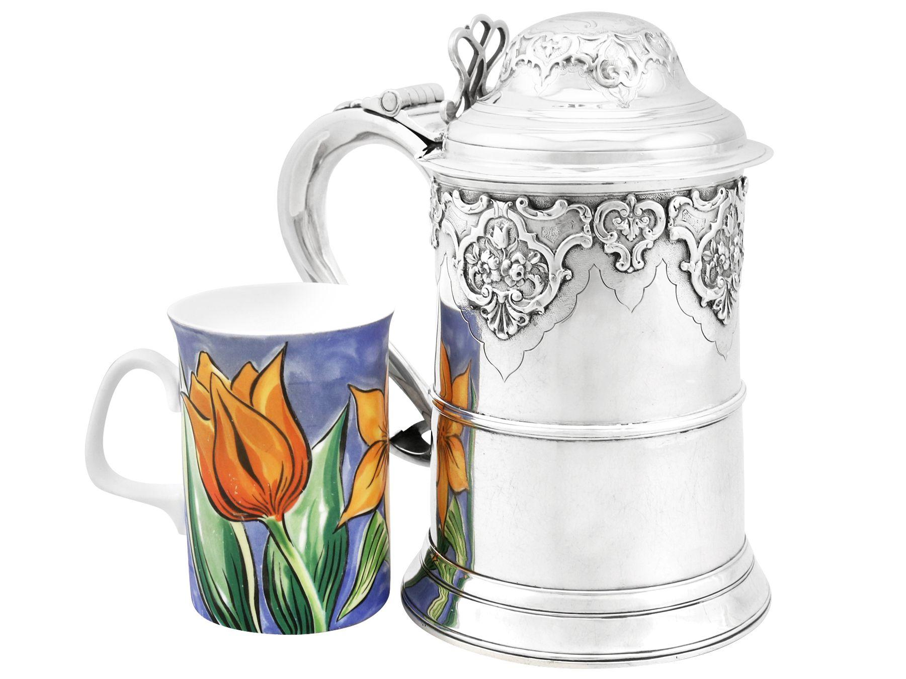 An exceptional, fine and impressive antique Georgian Newcastle sterling silver quart tankard made by Dorothy Langlands, an addition to our silver tankard collection.

This exceptional antique Georgian sterling silver quart tankard has a plain