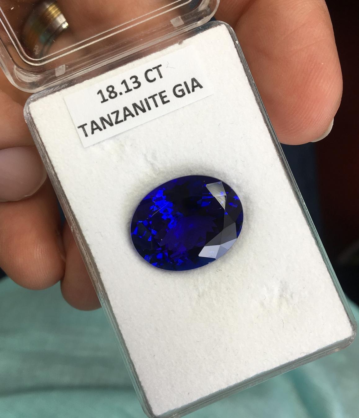 Women's 18.13ct GIA certified, oval Tanzanite ring in 18K rose gold. For Sale
