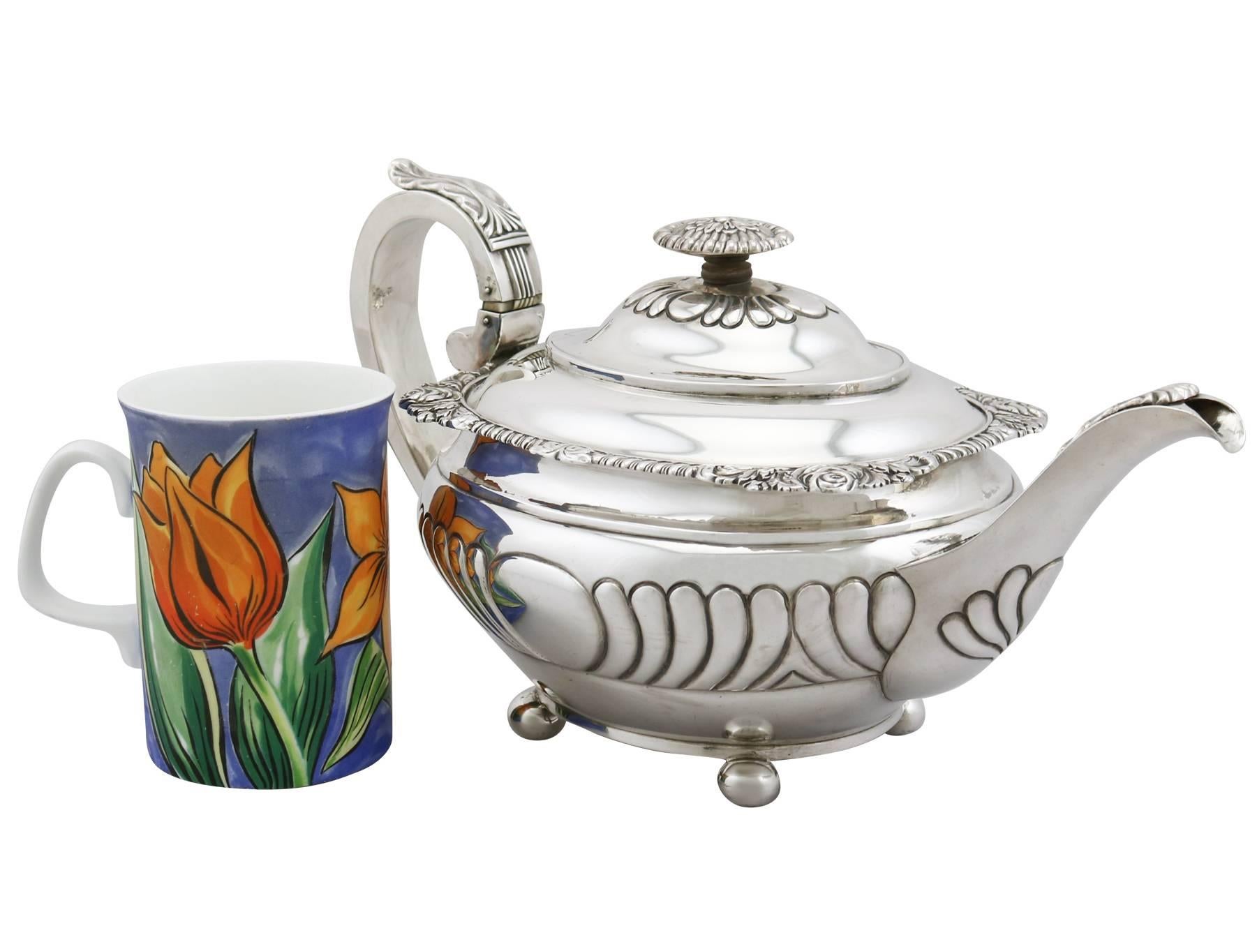 An exceptional, fine and impressive antique Georgian English sterling silver teapot made in York by James Barber & William Whitwell; an addition to our silver teaware collection.

This exceptional antique George III sterling silver teapot has an