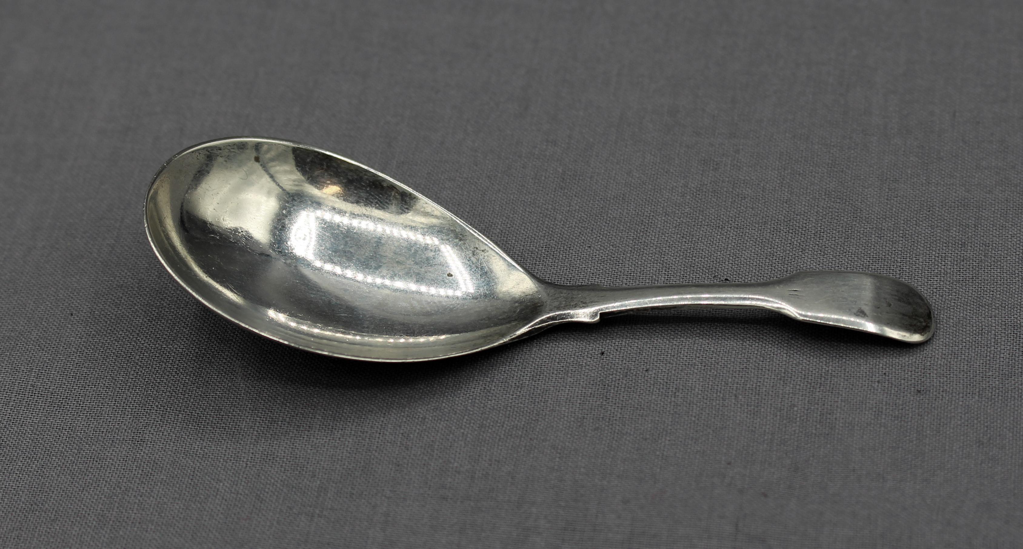 George III sterling silver tea caddy spoon, London, 1817. Fiddle back pattern. By Richard Turner, spoonmaker, Islington Road. 0.50 troy oz. 15 grams.
3 13/16