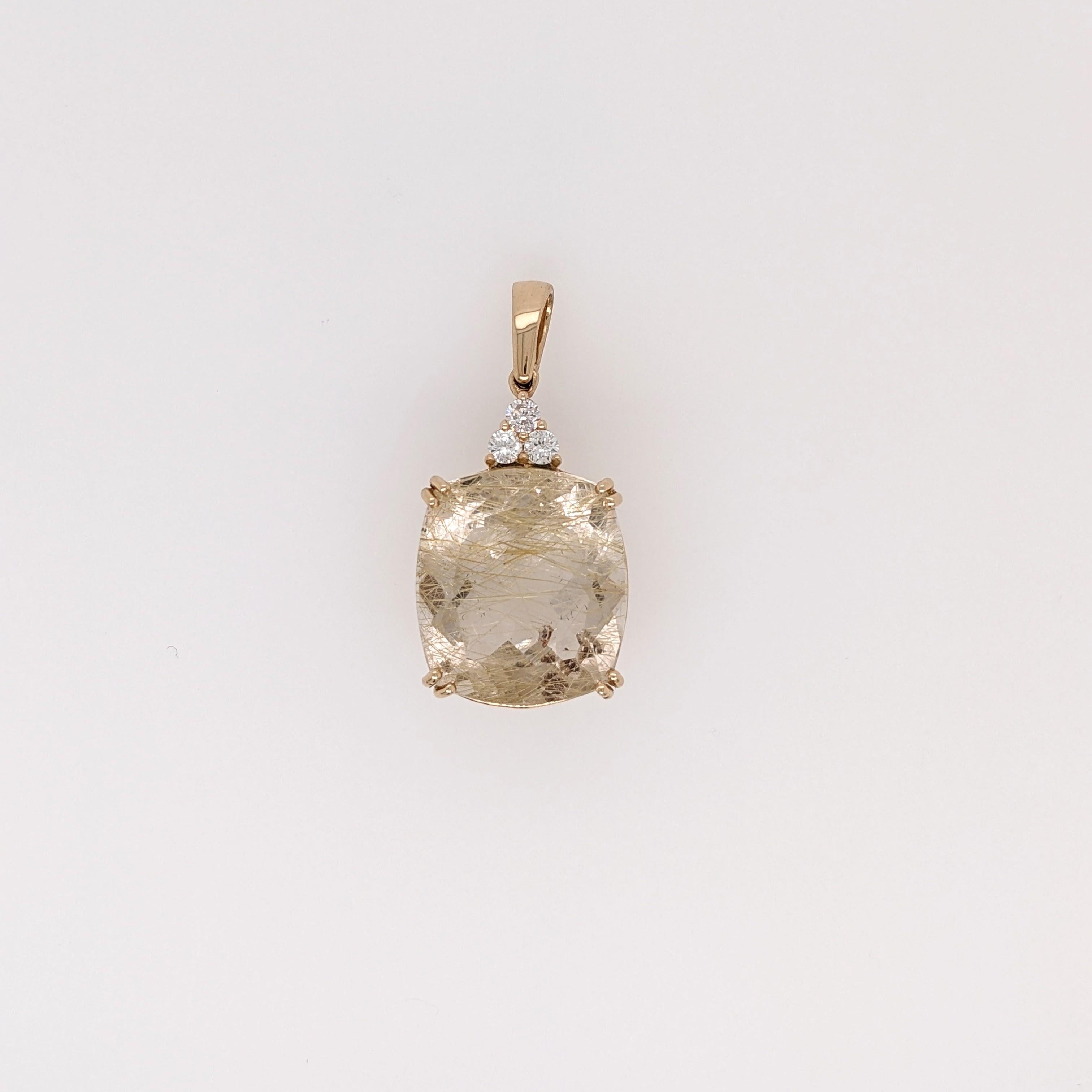 This beautiful rutilated quartz pendant can make a stunning addition to any outfit! Set in 14k solid gold with sparkly natural diamond accents.

Specifications:

Item Type: Pendant
Center Stone: Quartz
Treatment: None
Weight: 18.1ct
Head size: