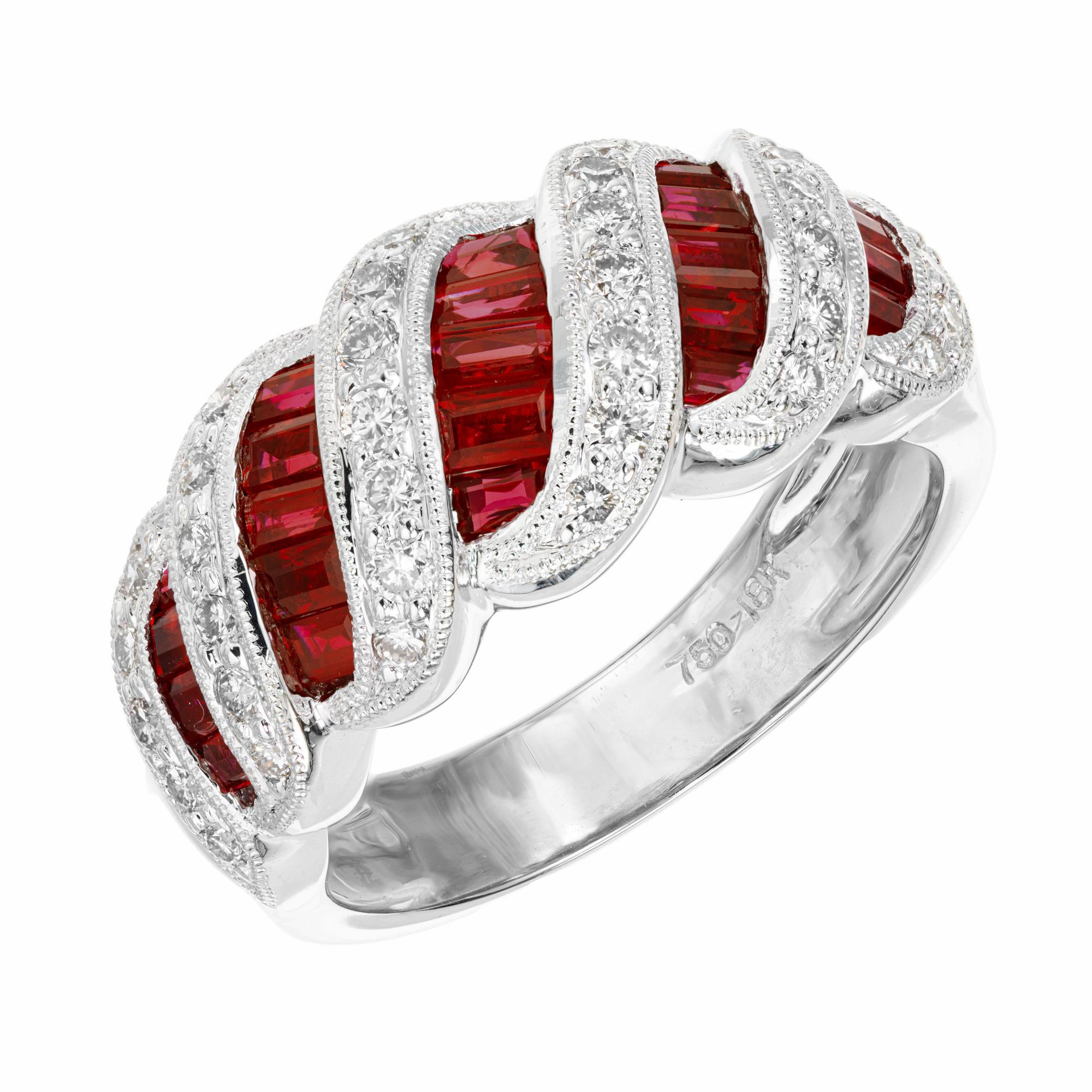 Dome Ruby and diamond band ring. 23 baguette shape rubies approximately totaling 1.46cts separated by 36 round cut diamonds approximately totaling .36cts set in 18k white gold beaded swirls. The rubies are a rich red color complimented by bright