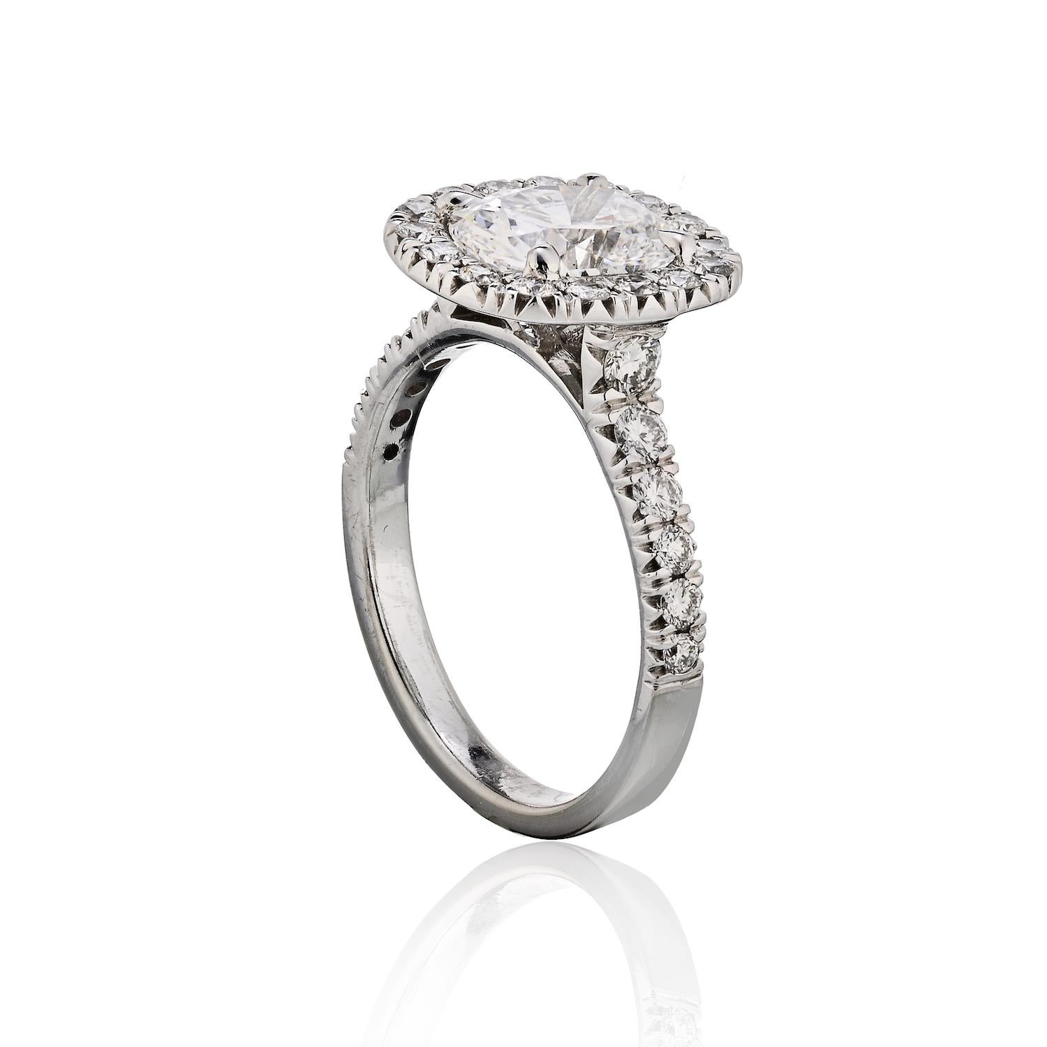Ladies white gold cushion cut diamond Halo-set ring featuring a 1.82 Carat Cushion cut Diamond of (D color and SI1 clarity. Also set with (42) Round Brilliant cut diamonds weighing approximately 0.50 carat total weight. 
Ring size 7. 

Very Good