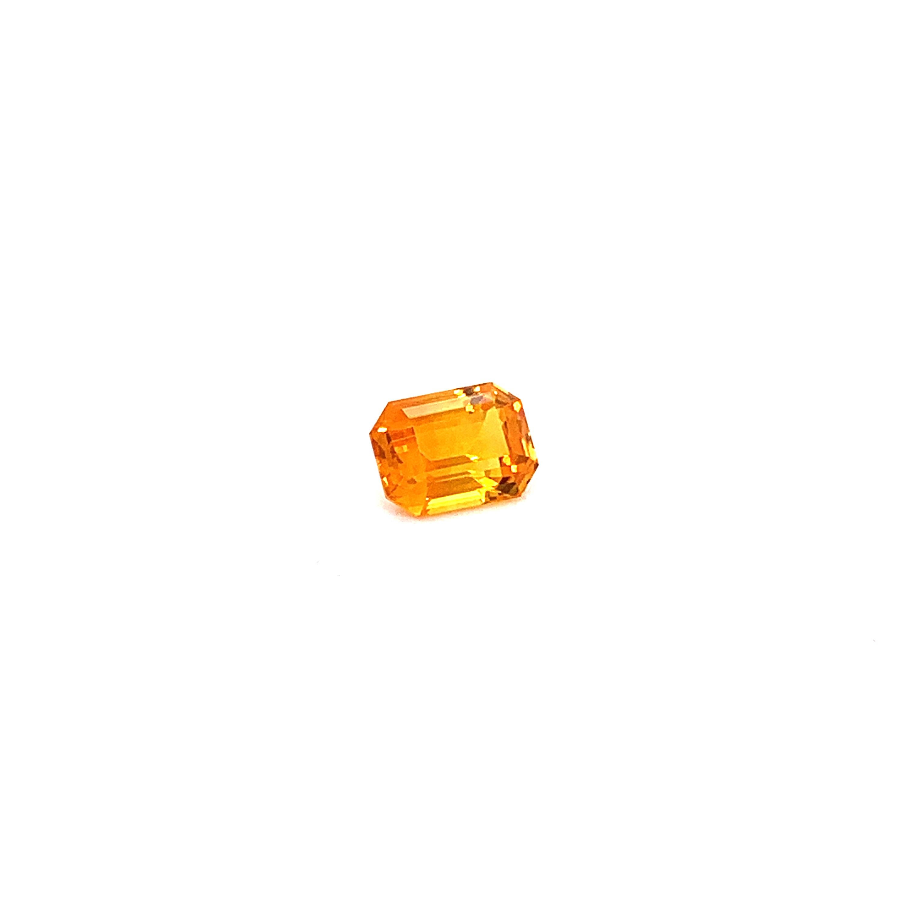 1.82 Carat Emerald-Cut Natural Orange Sapphire:

A beautiful stone, it is an emerald-cut orange sapphire weighing a total of 1.82 carat. The sapphire has excellent cutting proportions, and possess extremely fine colour saturation and brilliance. The