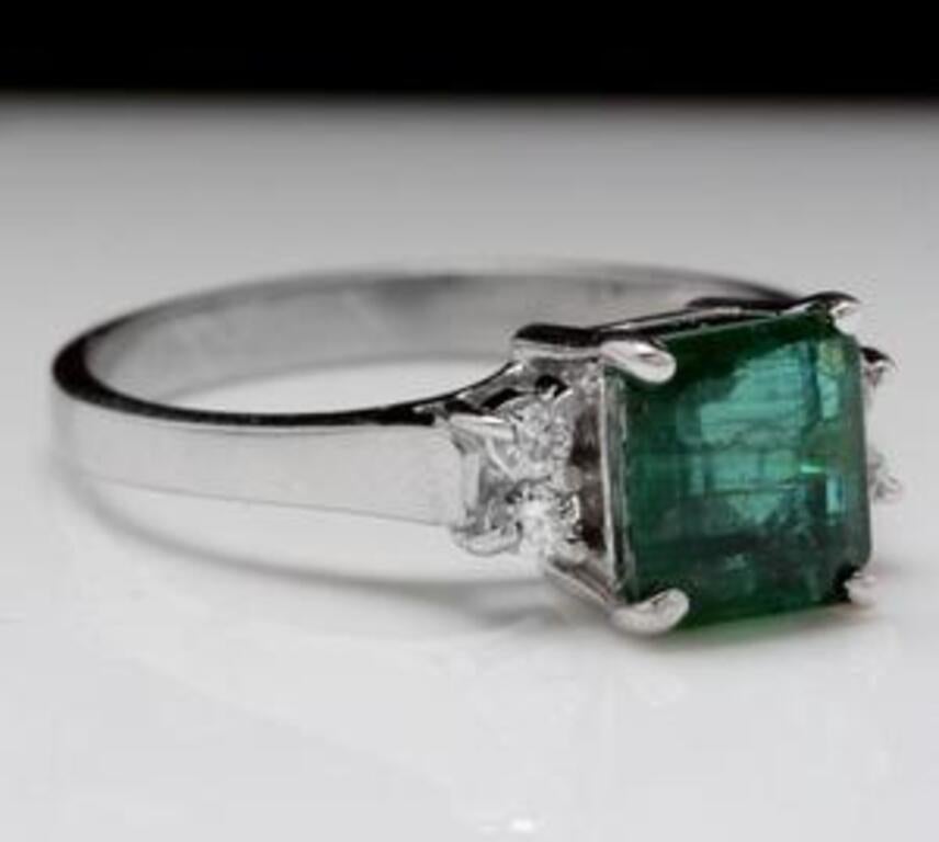 1.82 Carats Natural Emerald and Diamond 14K Solid White Gold Ring

Total Natural Green Emerald Weight is: 1.70 Carats (transparent)

Emerald Measures: 7.25 x 6.29mm

Natural Round Diamonds Weight: .12 Carats (color G / Clarity SI1)

Ring size: 7 (we