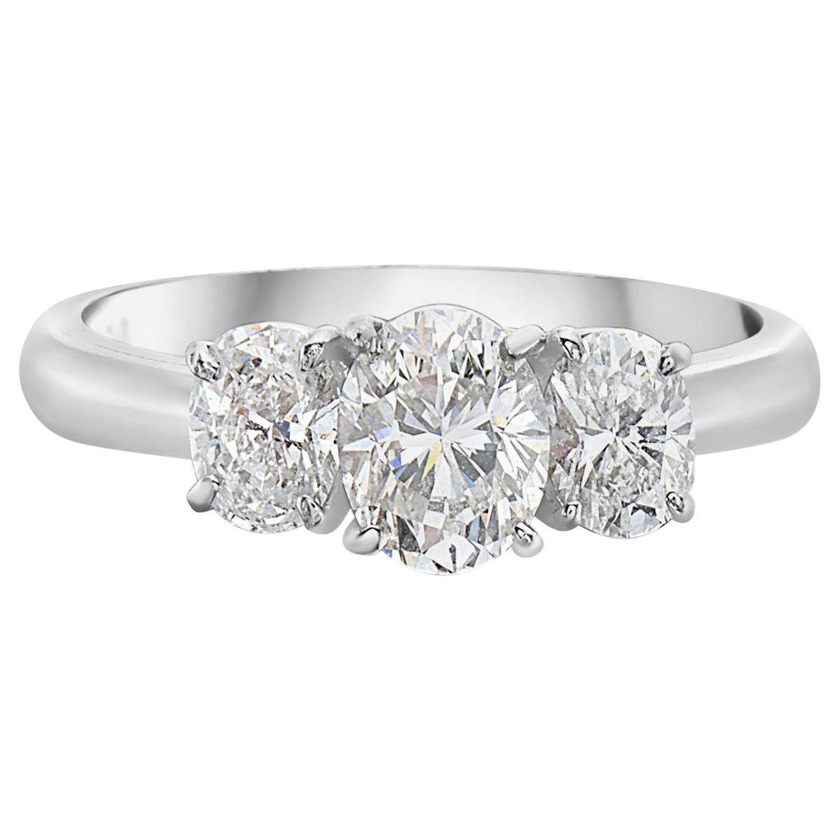 1.82 Carat Oval Trilogy Platinum Engagement Ring For Sale