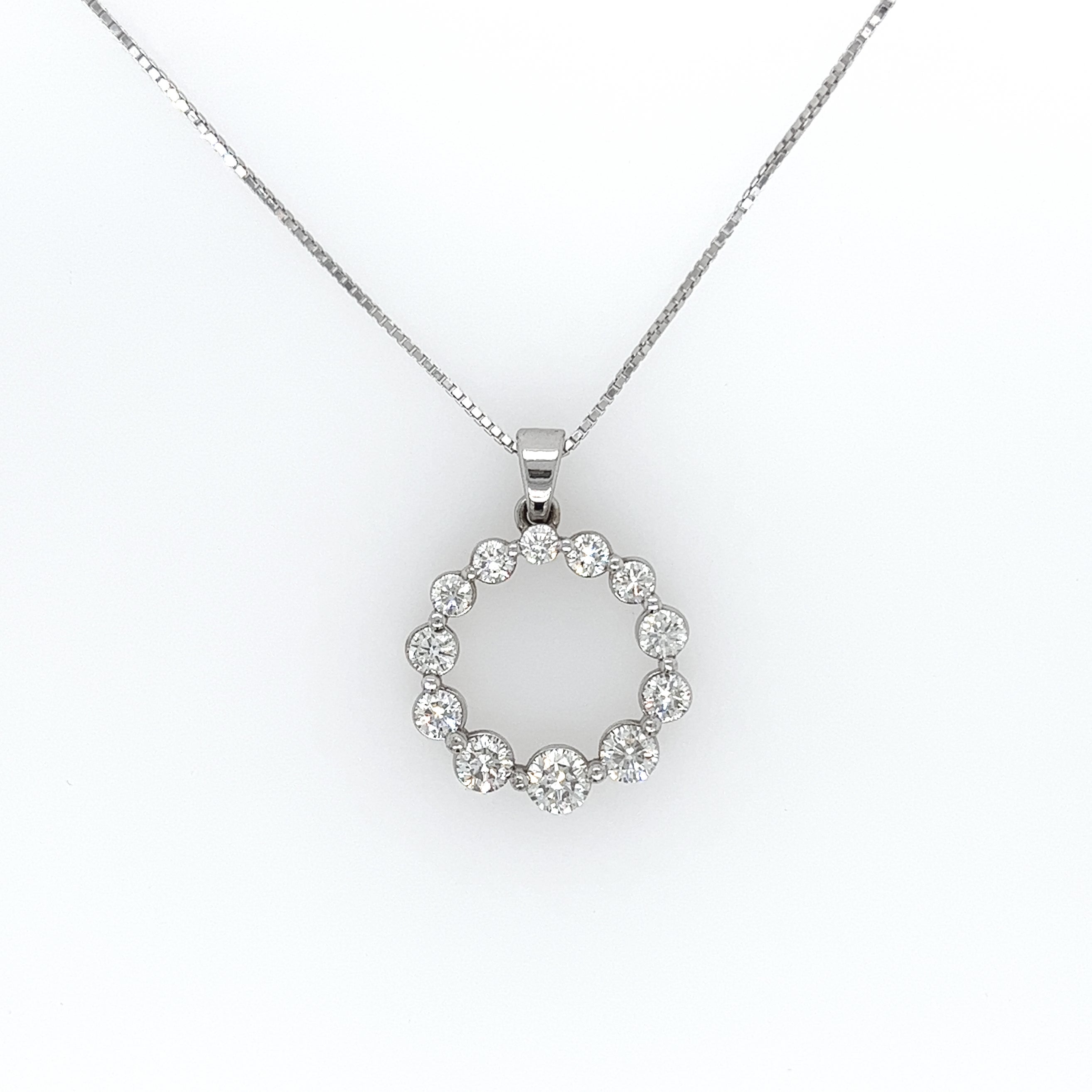 1.82 Carat Round Diamond Circle Of Life Pendant Necklace

-Material: 18K White Gold;
-Circle Width: 20mm;
-Diamonds: Round Brilliant Cuts, 1.82cts;
-Quality: F-G color, VS-SI clarity;
-Chain: 16 inches
-4.3grams

Handmade in New York City.