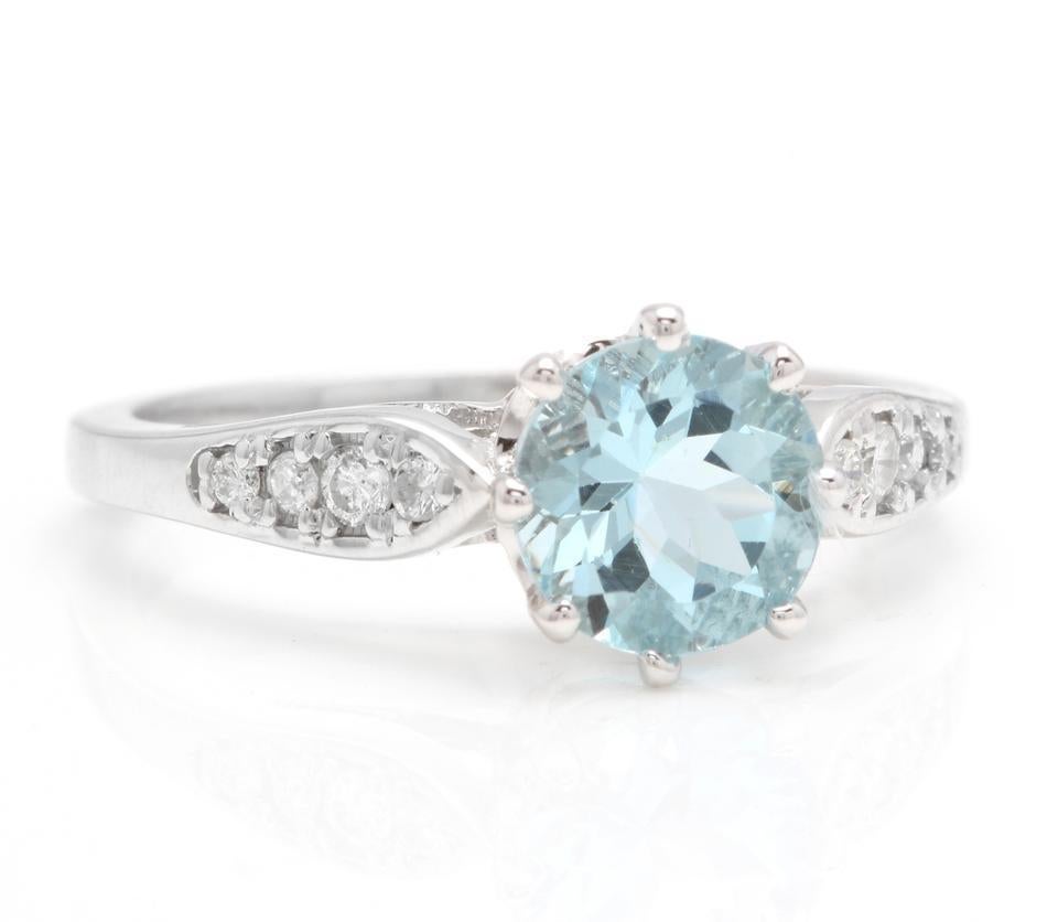 1.82 Carats Impressive Natural Aquamarine and Diamond 14K Solid White Gold Ring

Total Aquamarine Weight is: Approx. 1.70 Carats

Aquamarine Measures: Approx. 7.00mm

Aquamarine Treatment: Heating

Natural Round Diamonds Weight: Approx. 0.12 Carats