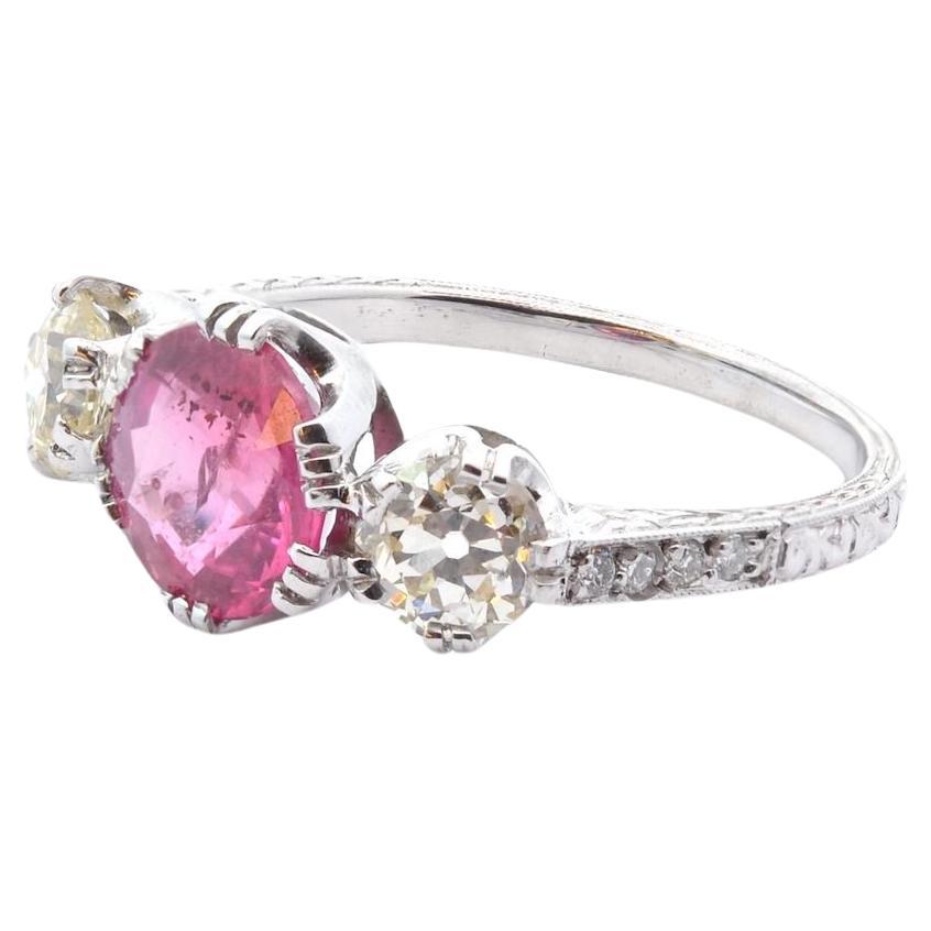 1.82 carats pink sapphire ring with 2 diamonds For Sale