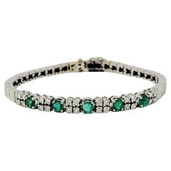 1.82 Carats Round Diamond and Emerald Link Bracelet in 18 Karat White Gold