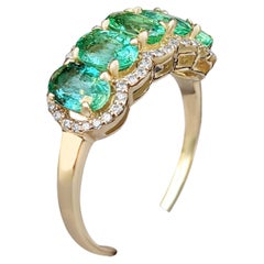 1.82 Ct Half Eternity Emerald & 0.20 Ct Diamonds, 14 Kt. Yellow Gold Ring