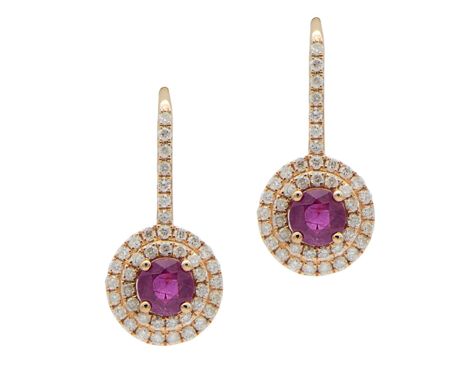 1.82 Total Carat Ruby and Diamond Double Halo Drop Earrings

These beautiful earrings feature lovely rubies in a delicate rose gold setting that perfectly compliments their color. The double halo is created from petite natural diamonds. These trendy