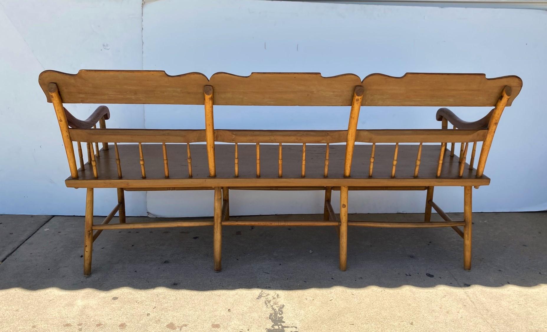Fine & rare antique American half-spindled Federal period Windsor bench Baltimore, Circa 1820.
 The bench has a half row of spindles on three sides (a typical feature of Baltimore benches from this period) above a long plank seat and is raised on
