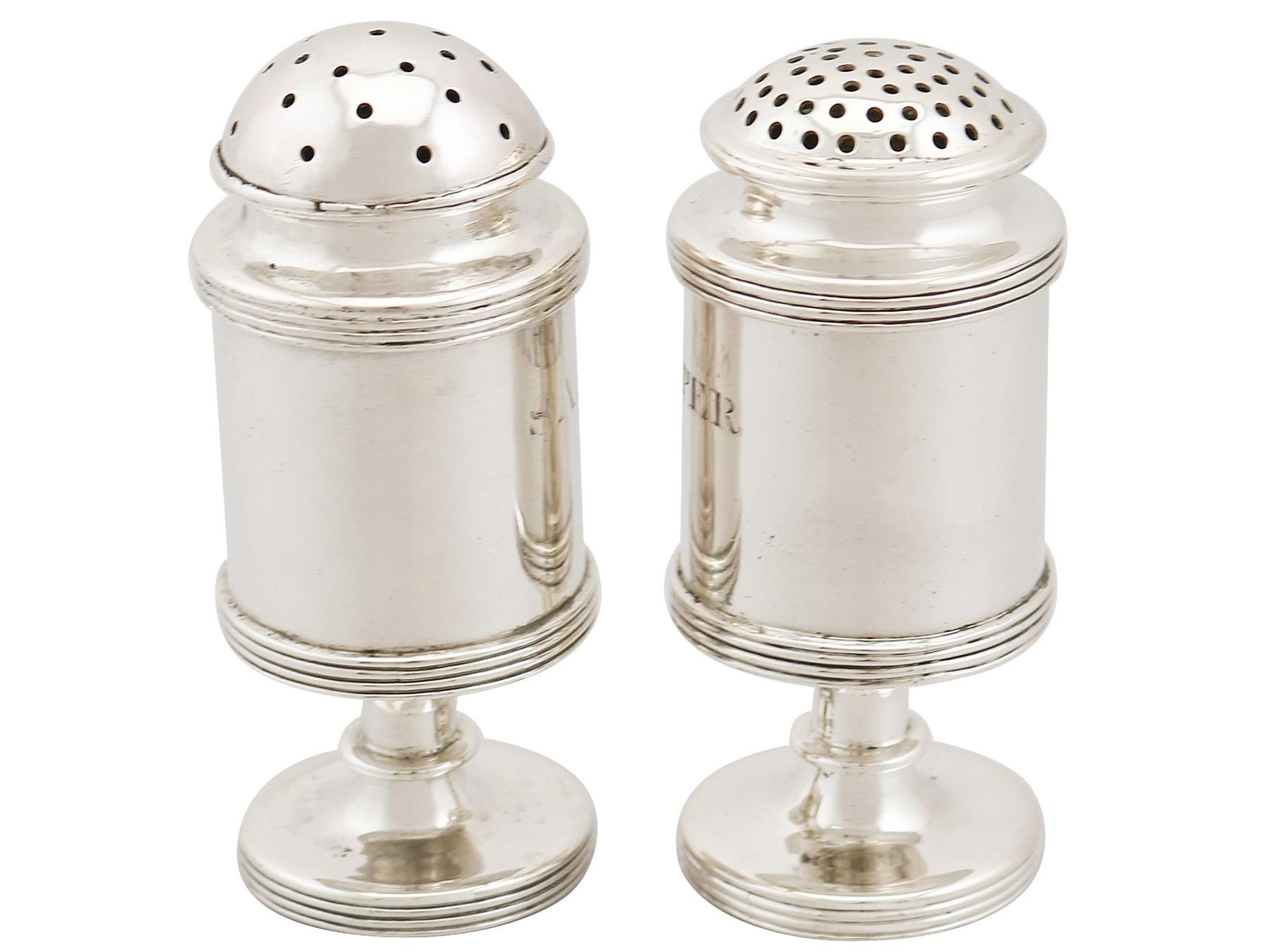 An exceptional, fine and impressive, large pair of antique Indian colonial silver salt and pepper shakers; an addition to our silver cruets/condiments collection.

These exceptional antique Indian colonial silver salt and pepper shakers have a