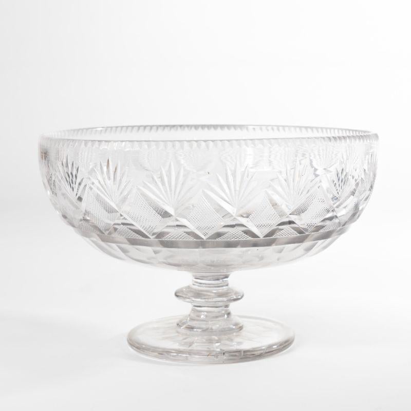 Footed cut glass bowl on a heavy baluster and circular footed base. The bowl is cut in a strawberry-diamond & fan pattern attributed to Bakewell & Page.
American, Pittsburgh, circa 1820.