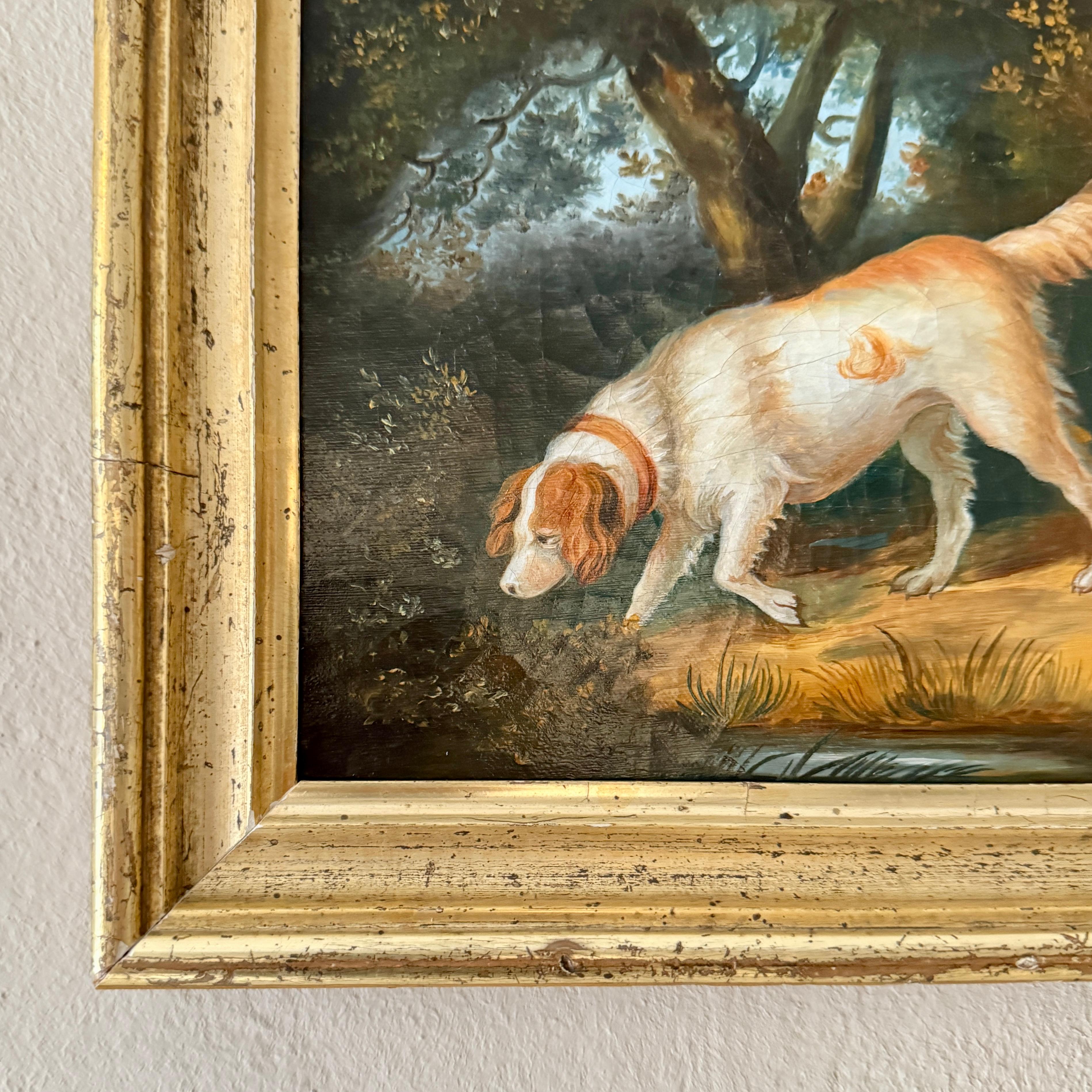 Début du XIXe siècle Peinture à l'huile Biedermeier des années 1820 représentant une scène de chasse avec deux chiens dans un paysage en vente