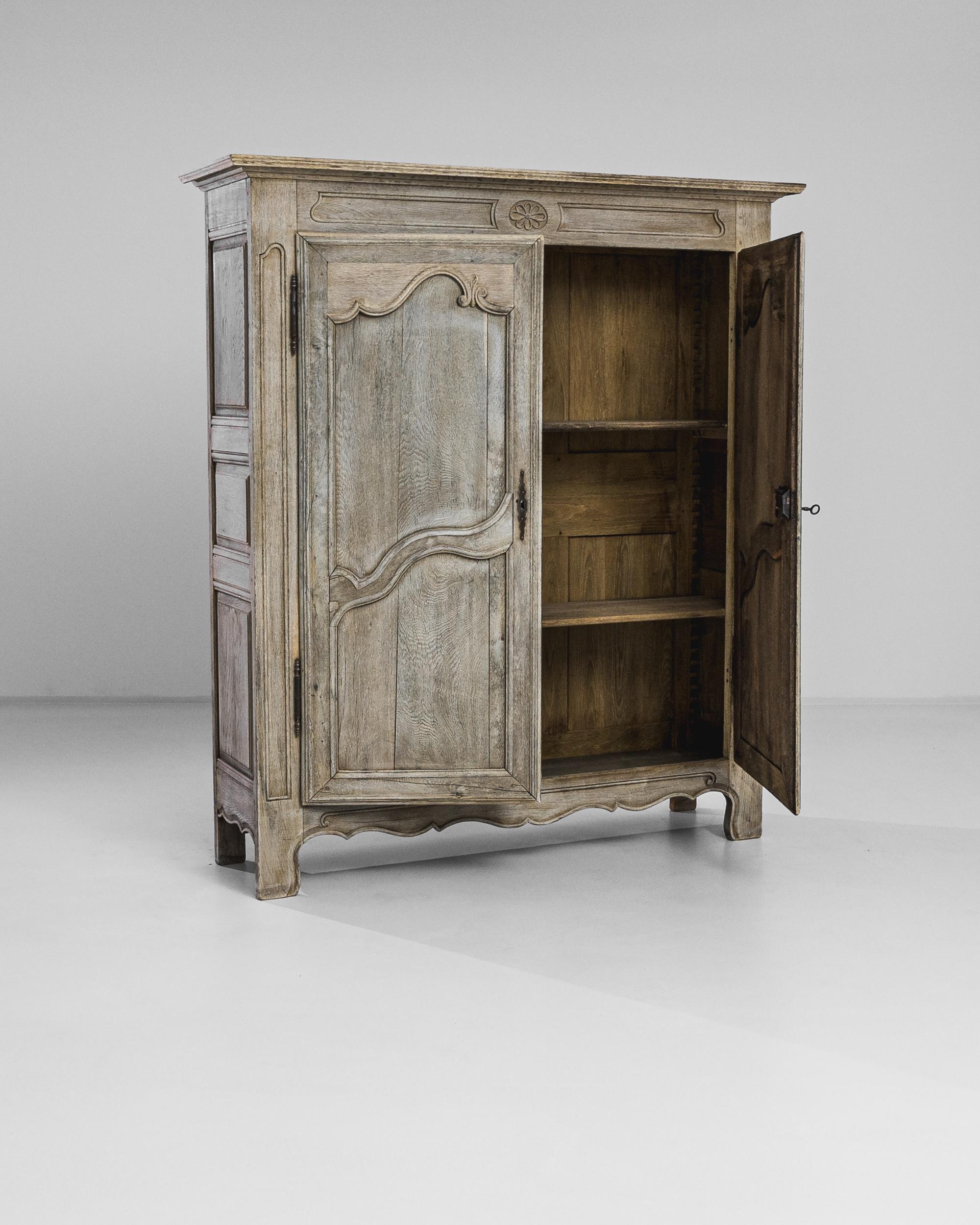 Hand-Carved 1820s French Bleached Oak Cabinet