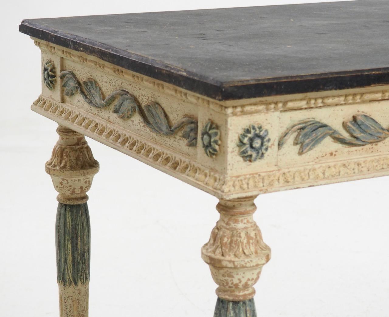 Very stunning, decorative and rare freestanding console table, scraped down to original paint, richly carved, circa 1820.