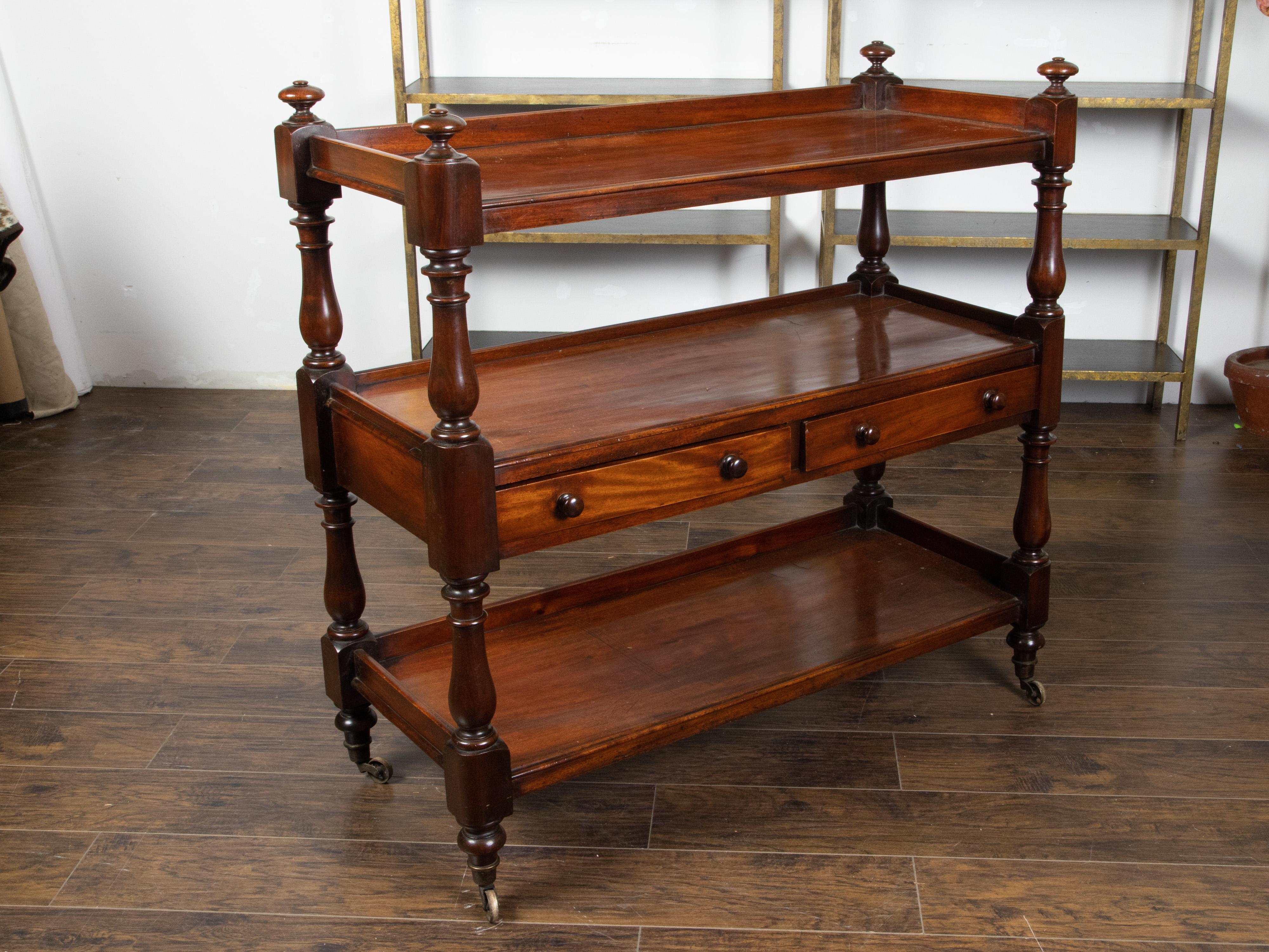 Turned 1820s Mahogany English Trolley on Casters with Open Shelves and Two Drawers For Sale