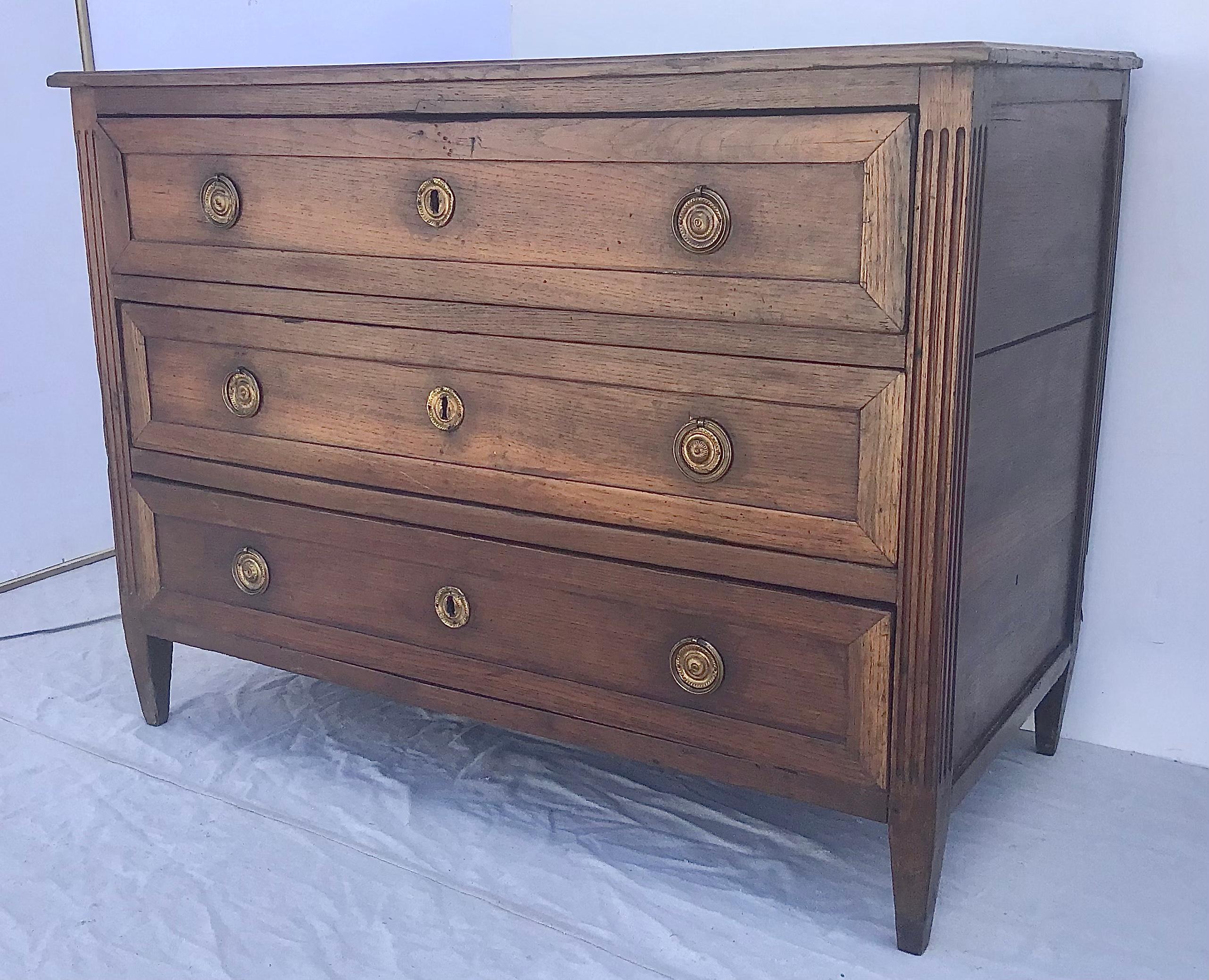 Wood 1820s Neoclassical Period French Three-Drawer Walnut Commode with Brass Trim