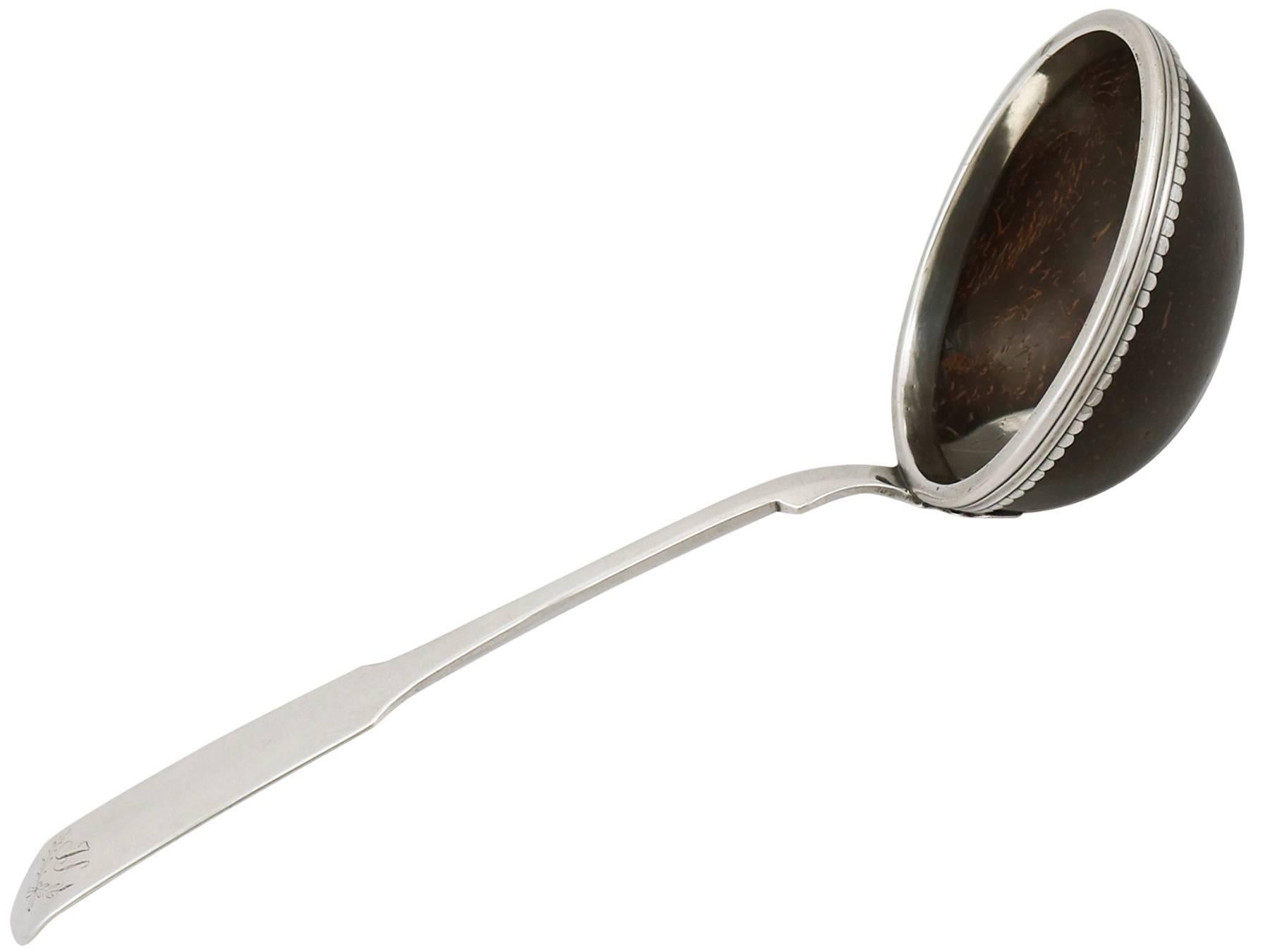 An exceptional, fine and impressive antique Russian silver mounted coconut ladle; an addition to our Russian silverware collection.

This exceptional antique Russian silver mounted coconut ladle has been crafted in the Fiddle pattern.

The anterior