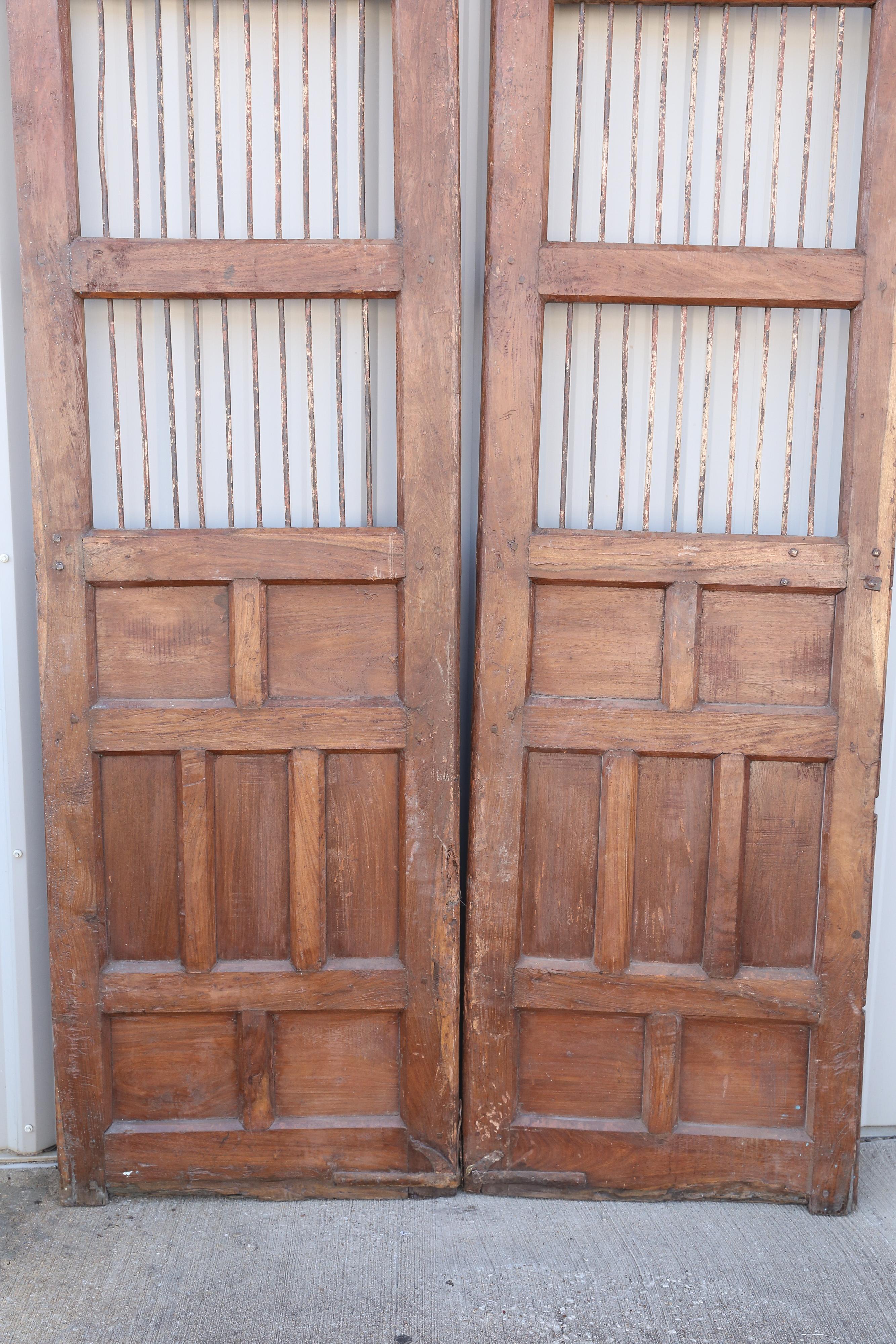 1820s Solid Teak Wood Side Entry Door of a Feudal Landlord's Court Yard Home In Good Condition For Sale In Houston, TX