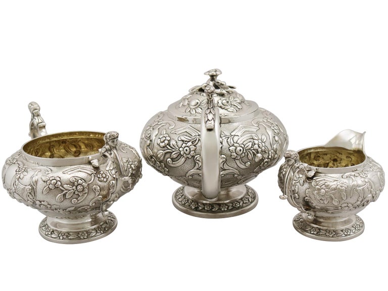 An exceptional, fine and impressive antique George IV Scottish sterling silver three-piece tea service / set; part of our silver Teaware collection.

This exceptional antique Scottish sterling silver tea service consists of a teapot, cream jug and