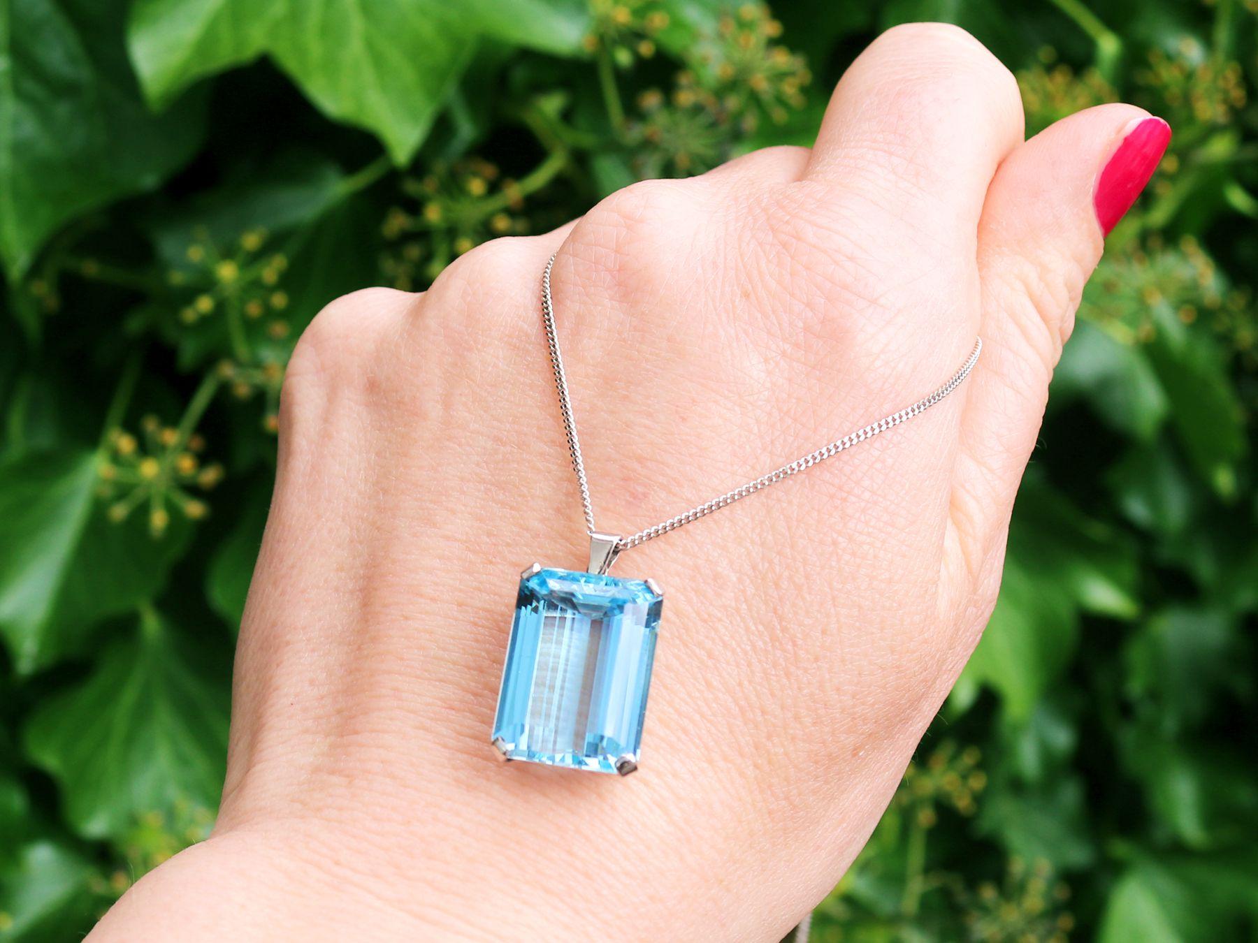 A stunning, fine and impressive vintage 18.27 carat aquamarine and contemporary platinum pendant; part of our diverse vintage jewellery and estate jewelry collections.

This stunning, fine and impressive aquamarine pendant has been crafted in