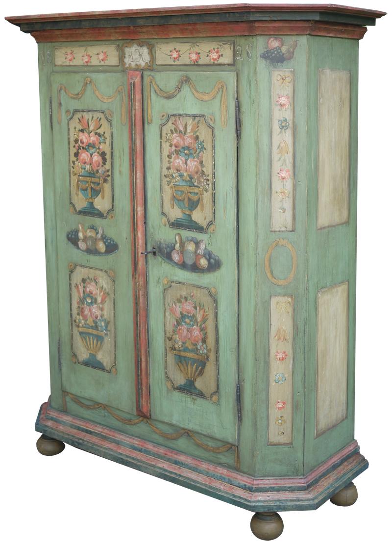 Floral and fruit painted wardrobe, 1828

H.180cm, L.127cm (147 alle cornici), P.48cm (60 alle cornici)
H. 70.8 in, W. 50 in (57.9 to the frames), D. 18.9 in (23.6 to the frames)

Painted cabinet with two doors, dated 1828. The entire structure