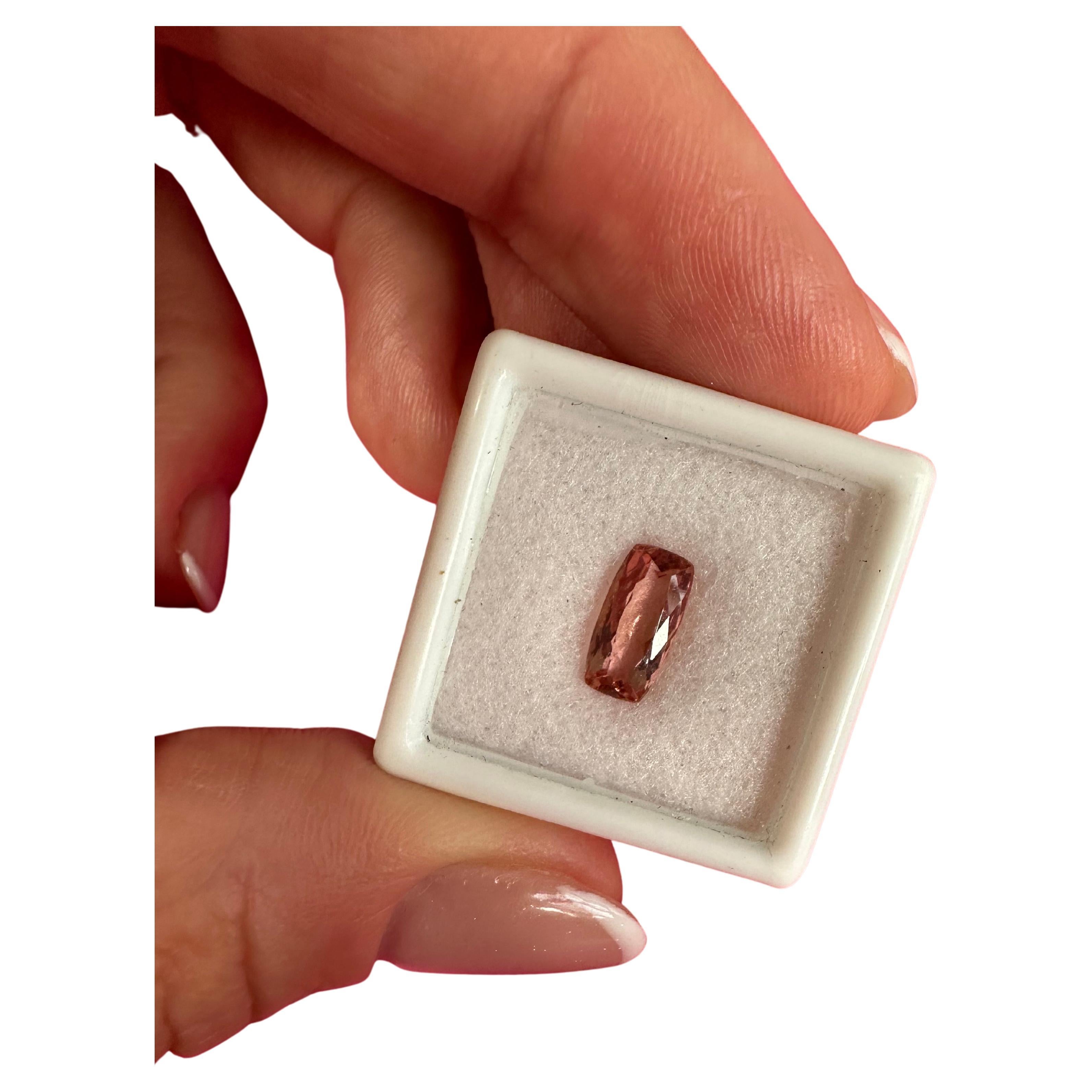 Stunning pink topaz, loose and unset, will come with a certificate of authenticity.

NATURAL GEMSTONE(S): TOPAZ (IMPERIAL)
Clarity/Color: Slightly Included/Pink
Cut: Rectangular 10.2 x 5.2mm
Treatment: none


WHAT YOU GET AT STAMPAR