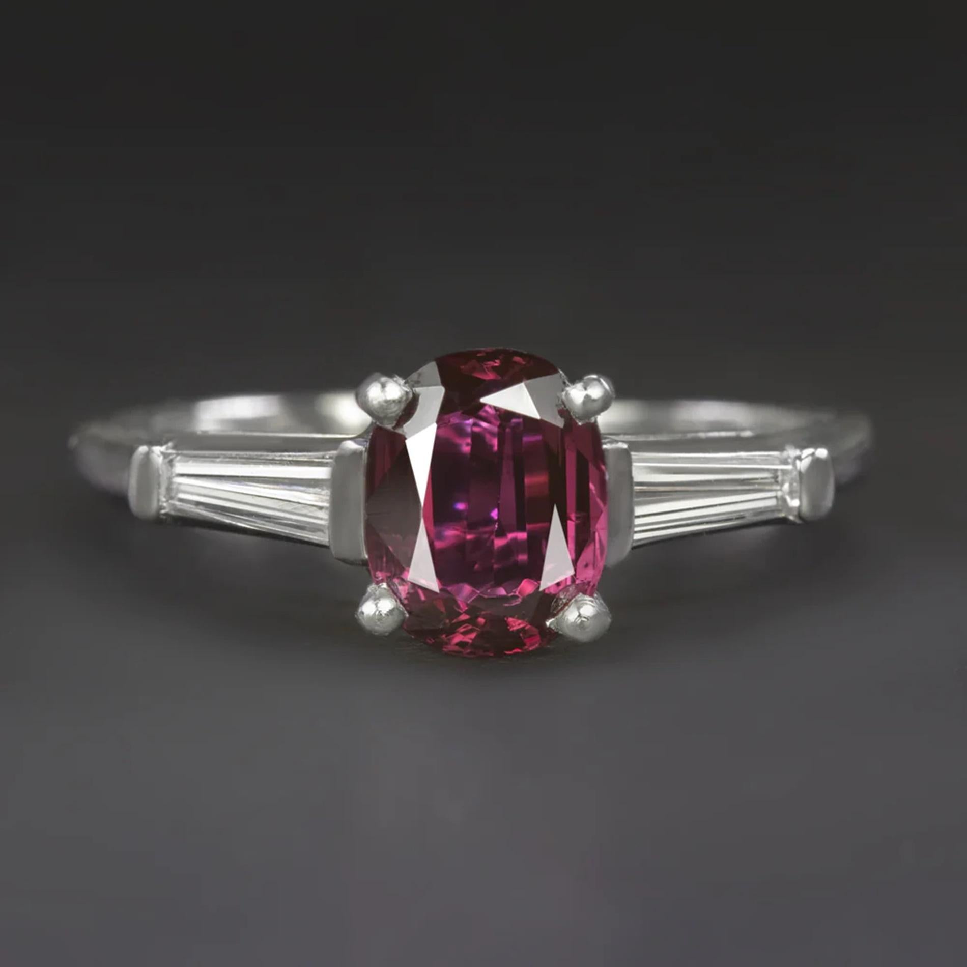 Indulge in the allure of this exquisite ring, featuring a mesmerizing 1.82 ct natural sapphire center with a rich and captivating red hue. This striking gemstone is a true statement of elegance and sophistication.

Key Highlights:

The center