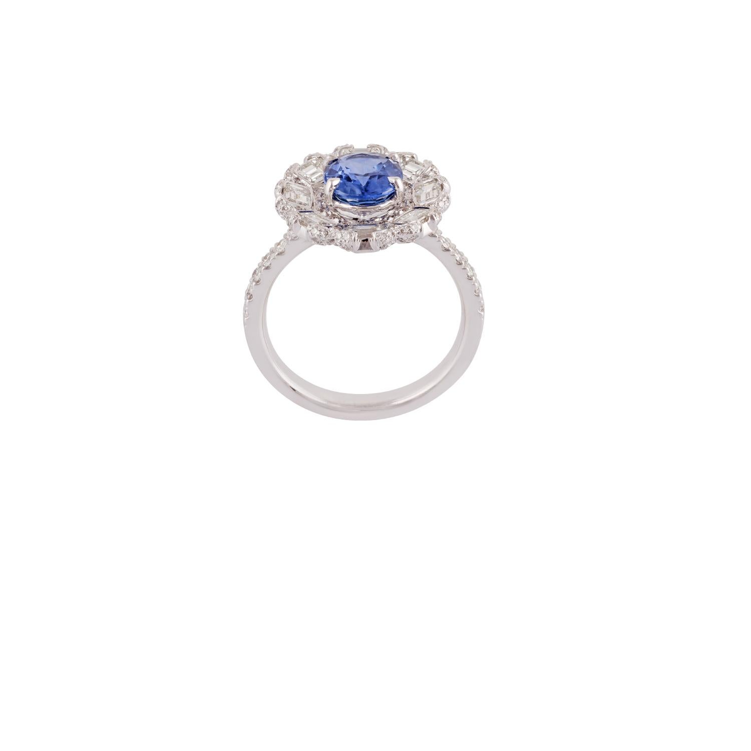 Blue Sapphire - 1.83 Carats
Emerald Cut Diamond - 1.13 Carats
Round Cut Diamond -0.64 Carat
18KT White Gold - 5.10 Grams