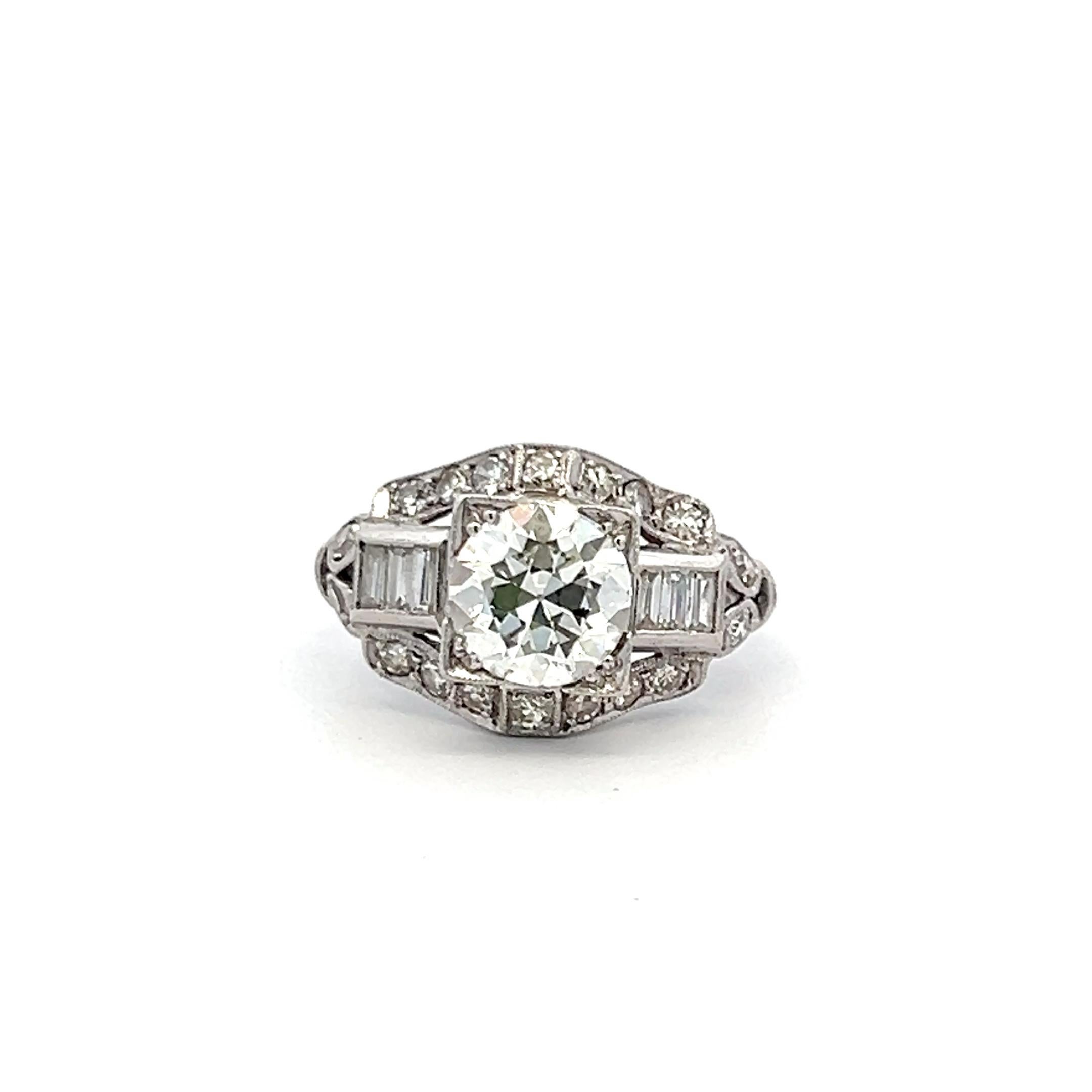1.83 Carat Circular Brilliant and Baguette Shape Diamond Platinum Art-Deco Ring In Good Condition For Sale In New York, NY