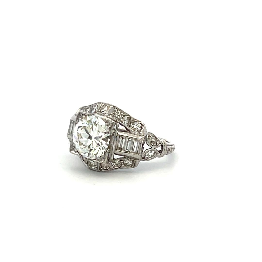 Women's 1.83 Carat Circular Brilliant and Baguette Shape Diamond Platinum Art-Deco Ring For Sale